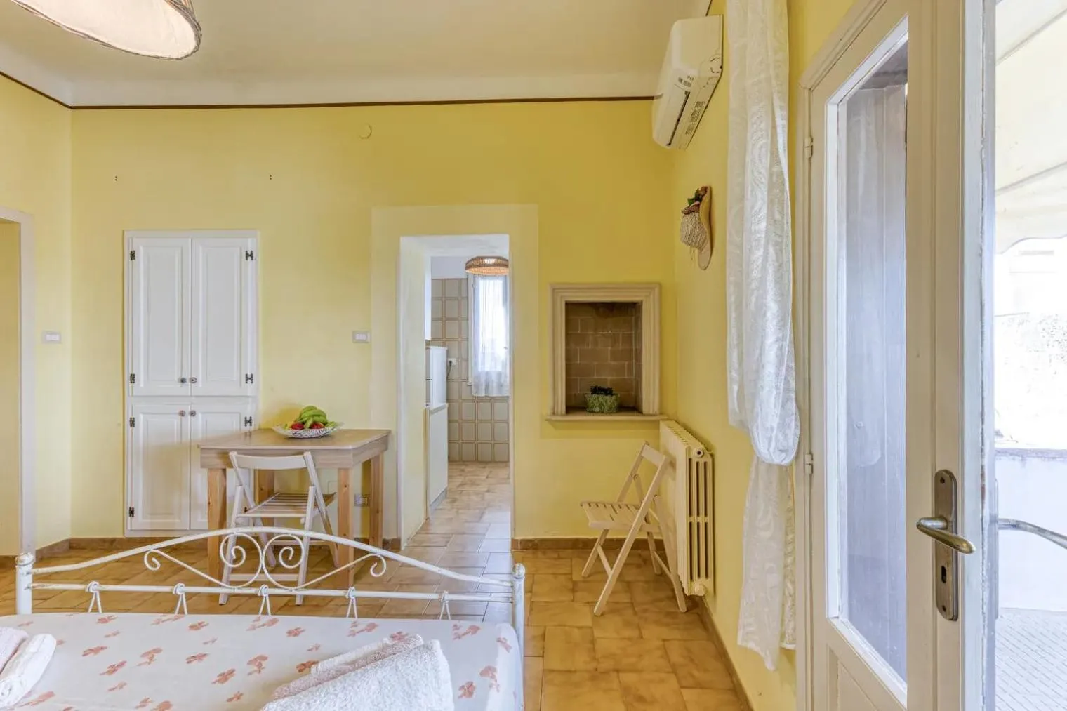 Seating area, Bed in La Corte dei Mille