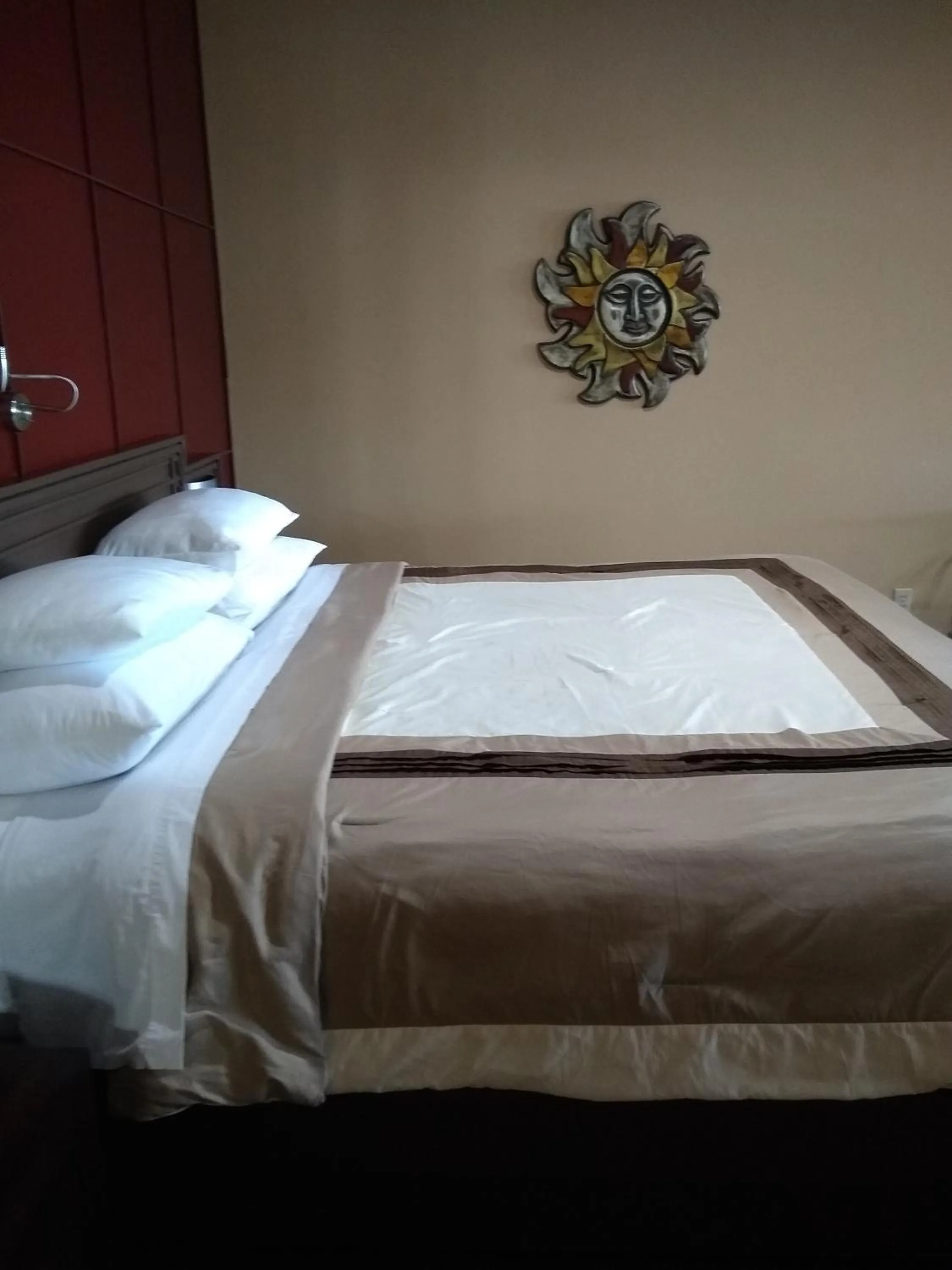 Bed in Southern Comfort Suites