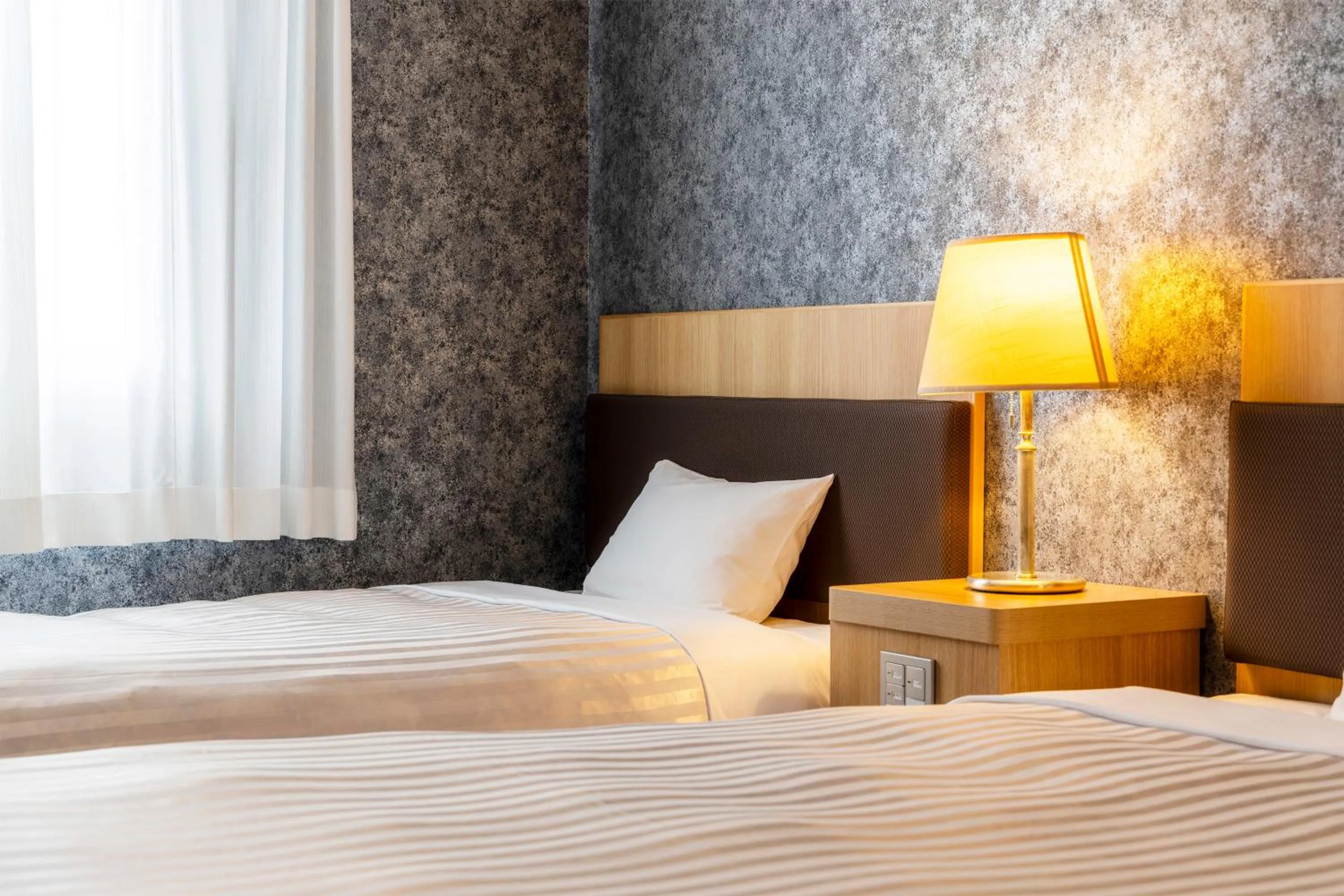 Bed in Miyakonojo Green Hotel