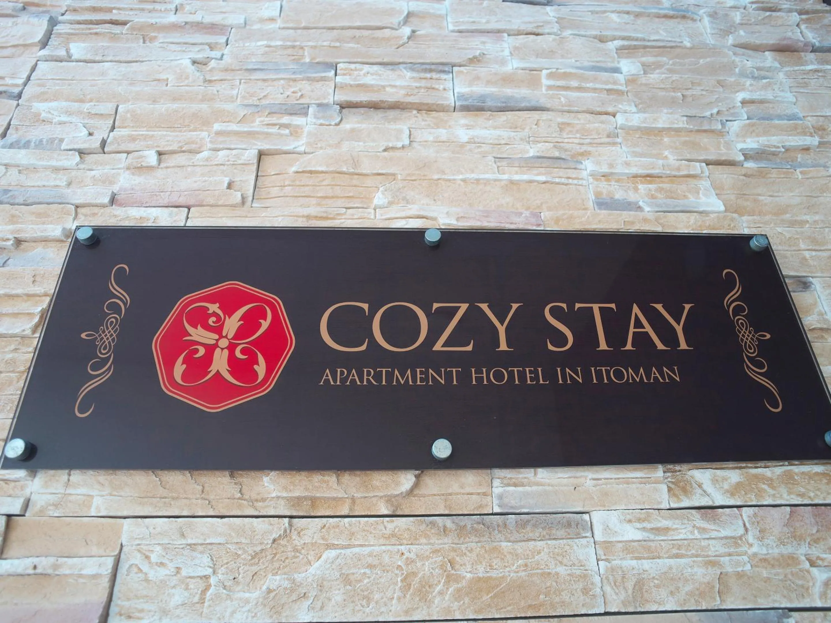 Property logo or sign in Cozy Stay In Itoman