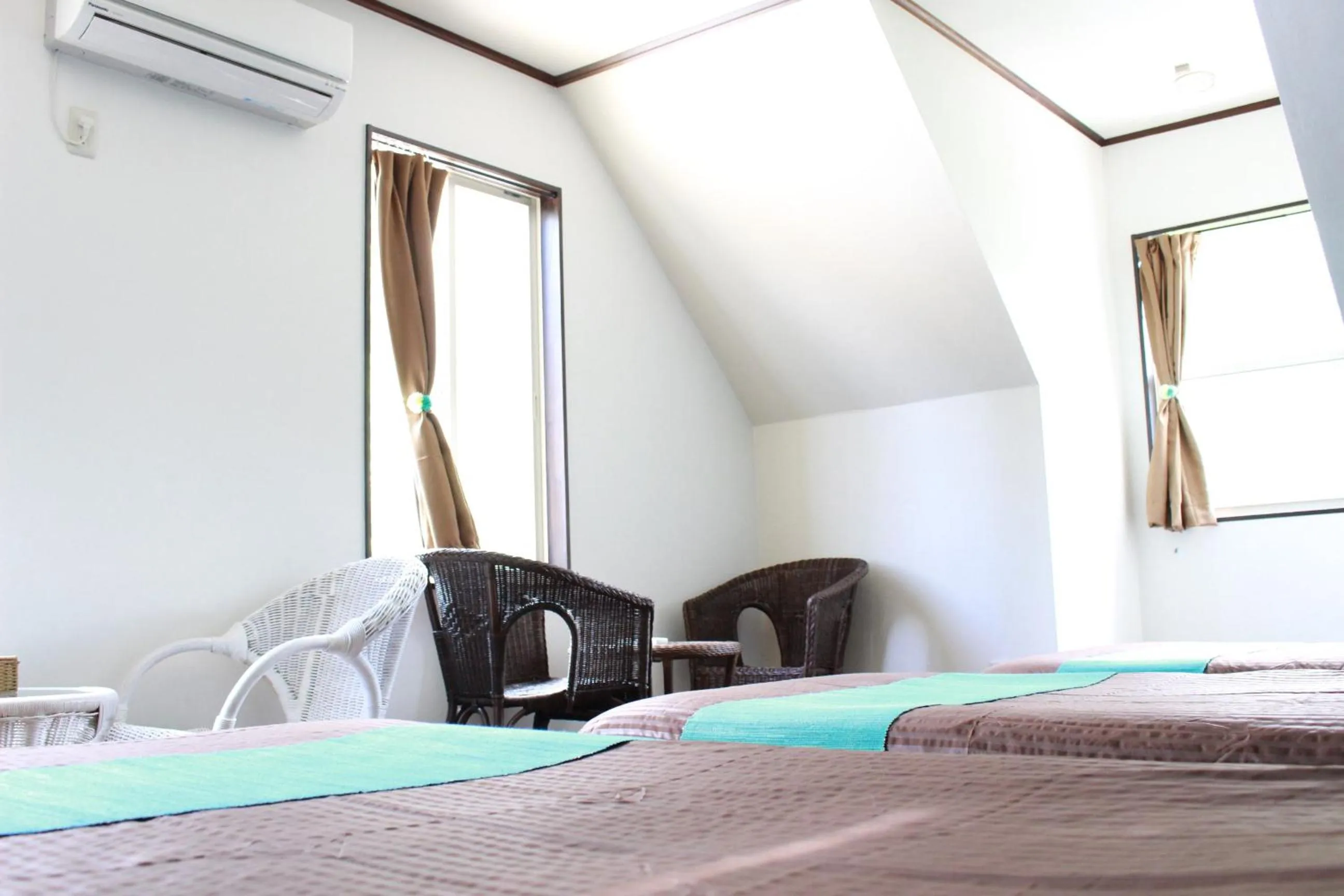 Bed in Nangoku Lodge Booya