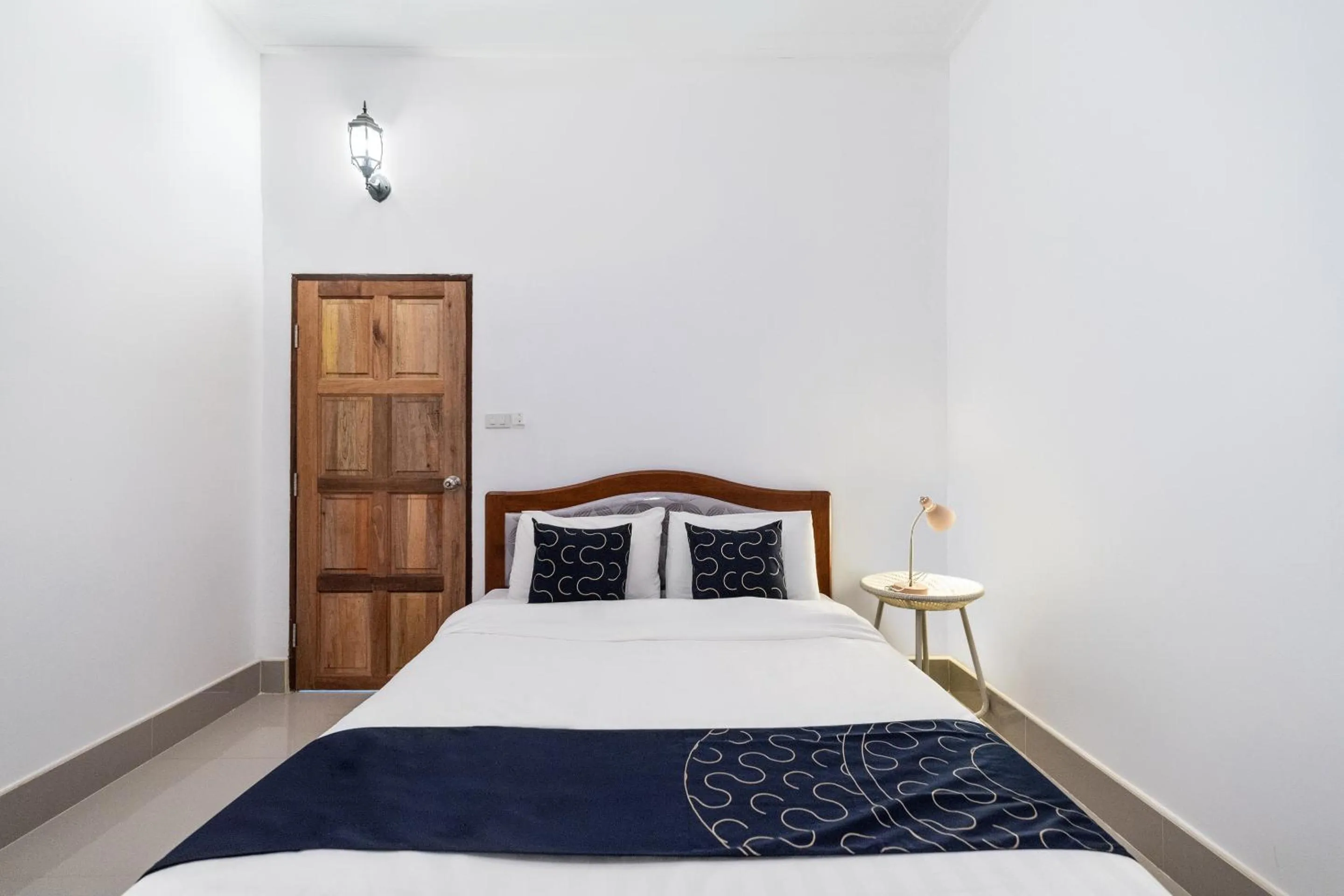 Bedroom in Capital O 805 Suan Palm Farm Nok Resort