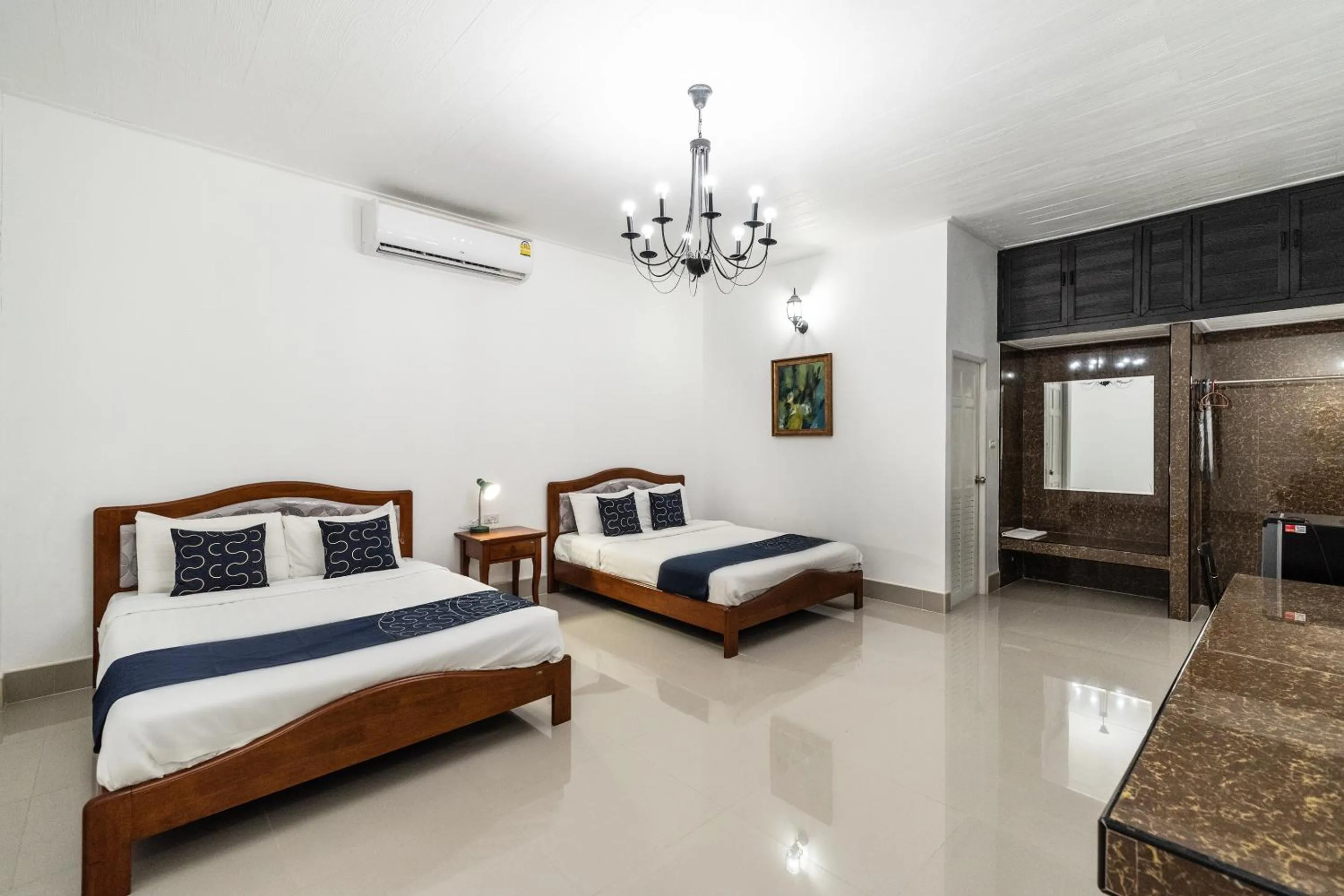 Bedroom in Capital O 805 Suan Palm Farm Nok Resort