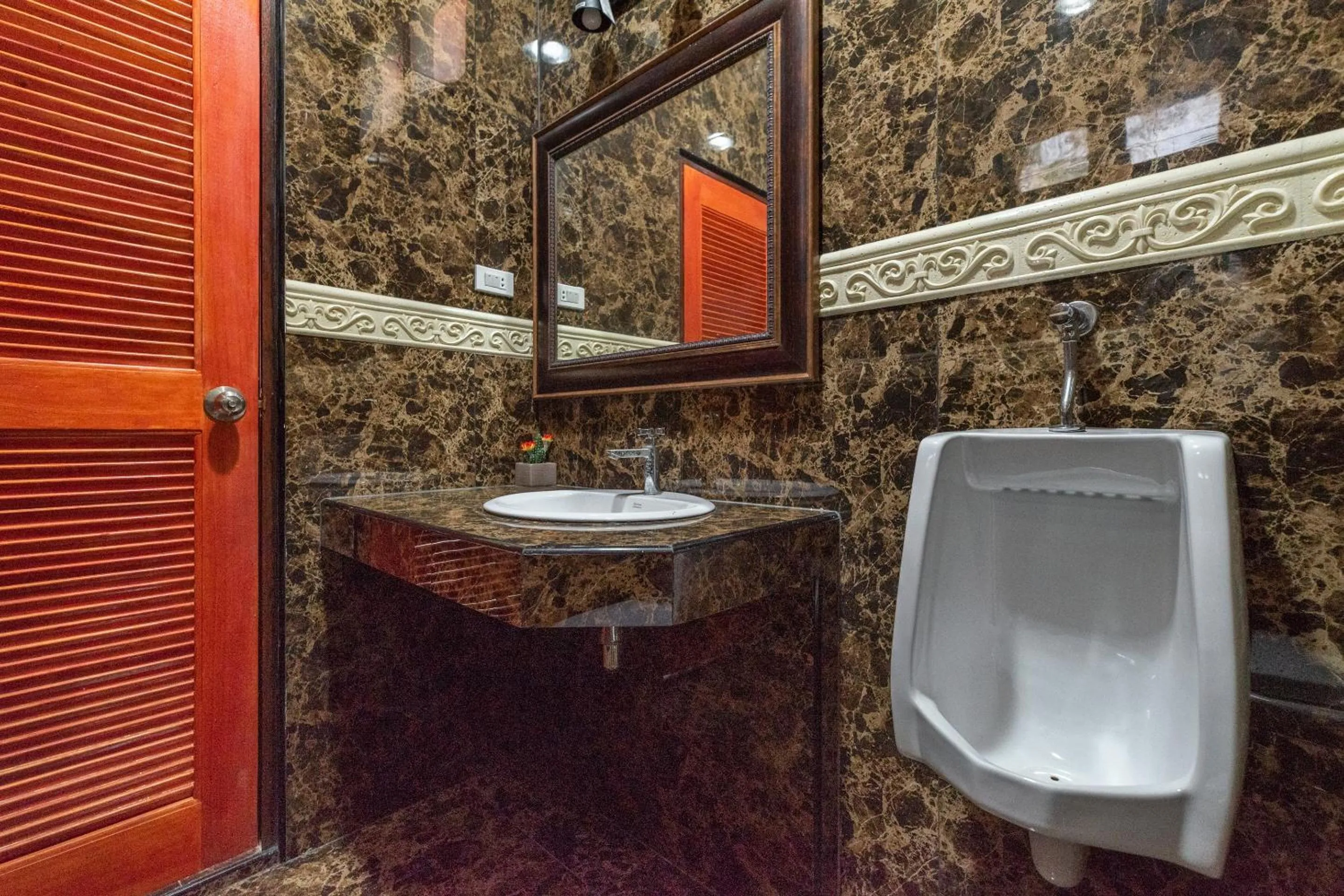 Bathroom in Capital O 805 Suan Palm Farm Nok Resort