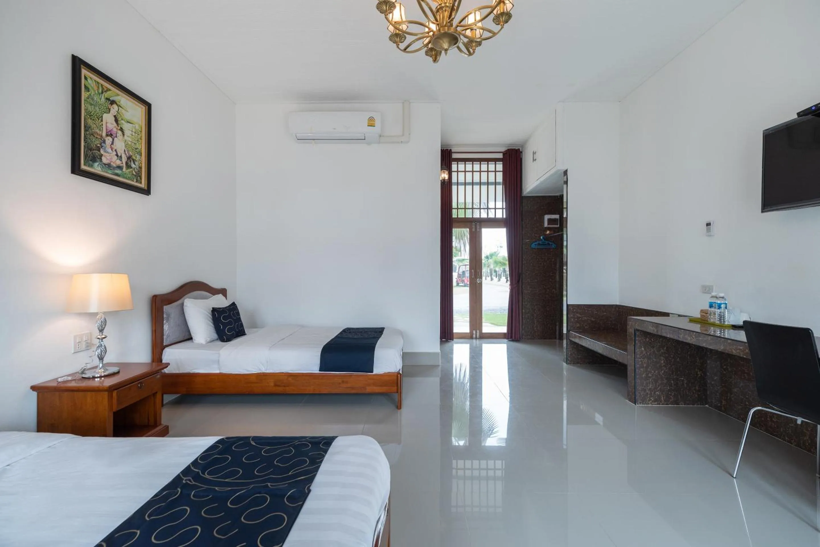 Bedroom in Capital O 805 Suan Palm Farm Nok Resort