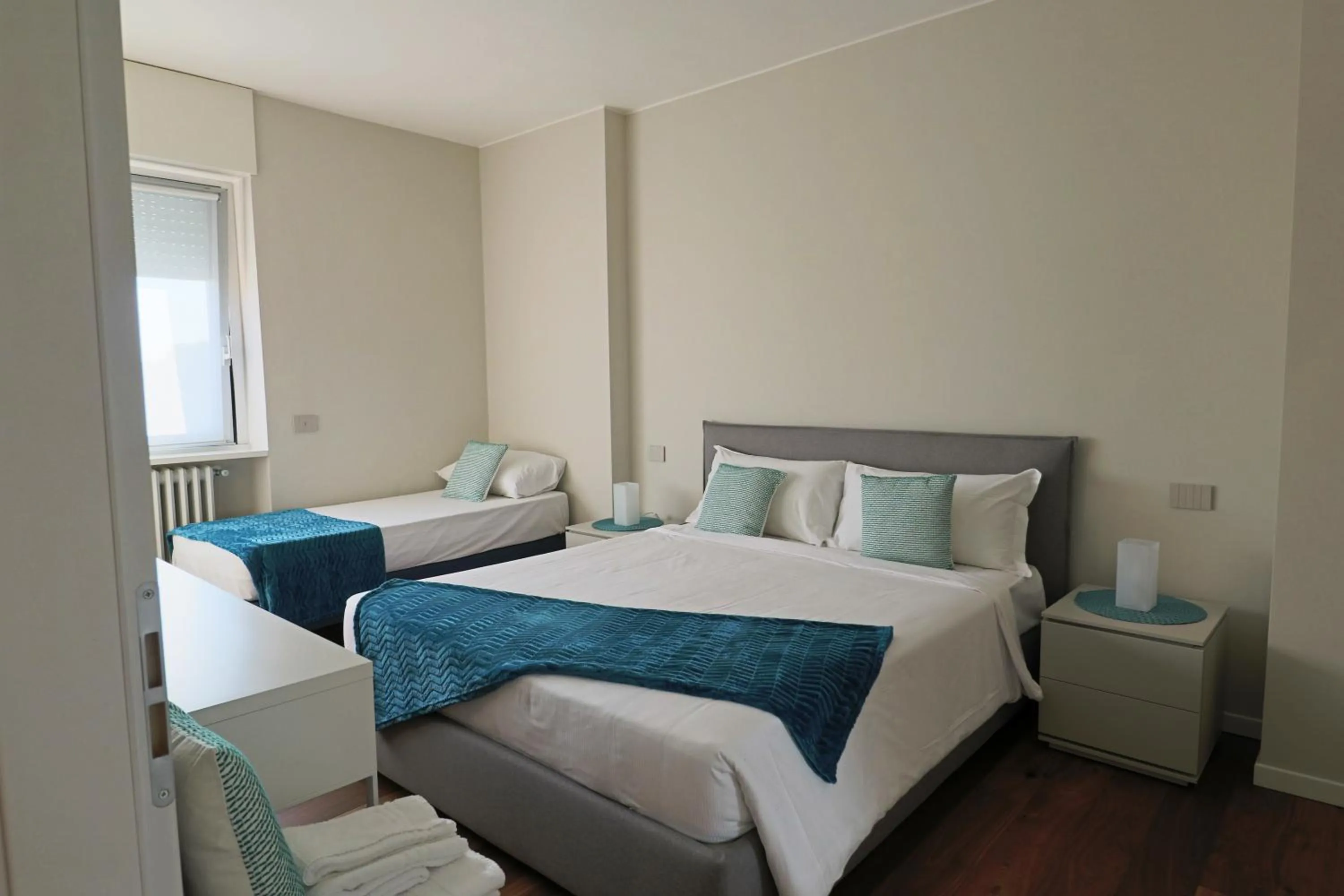 Bed in Aparthotel Isola