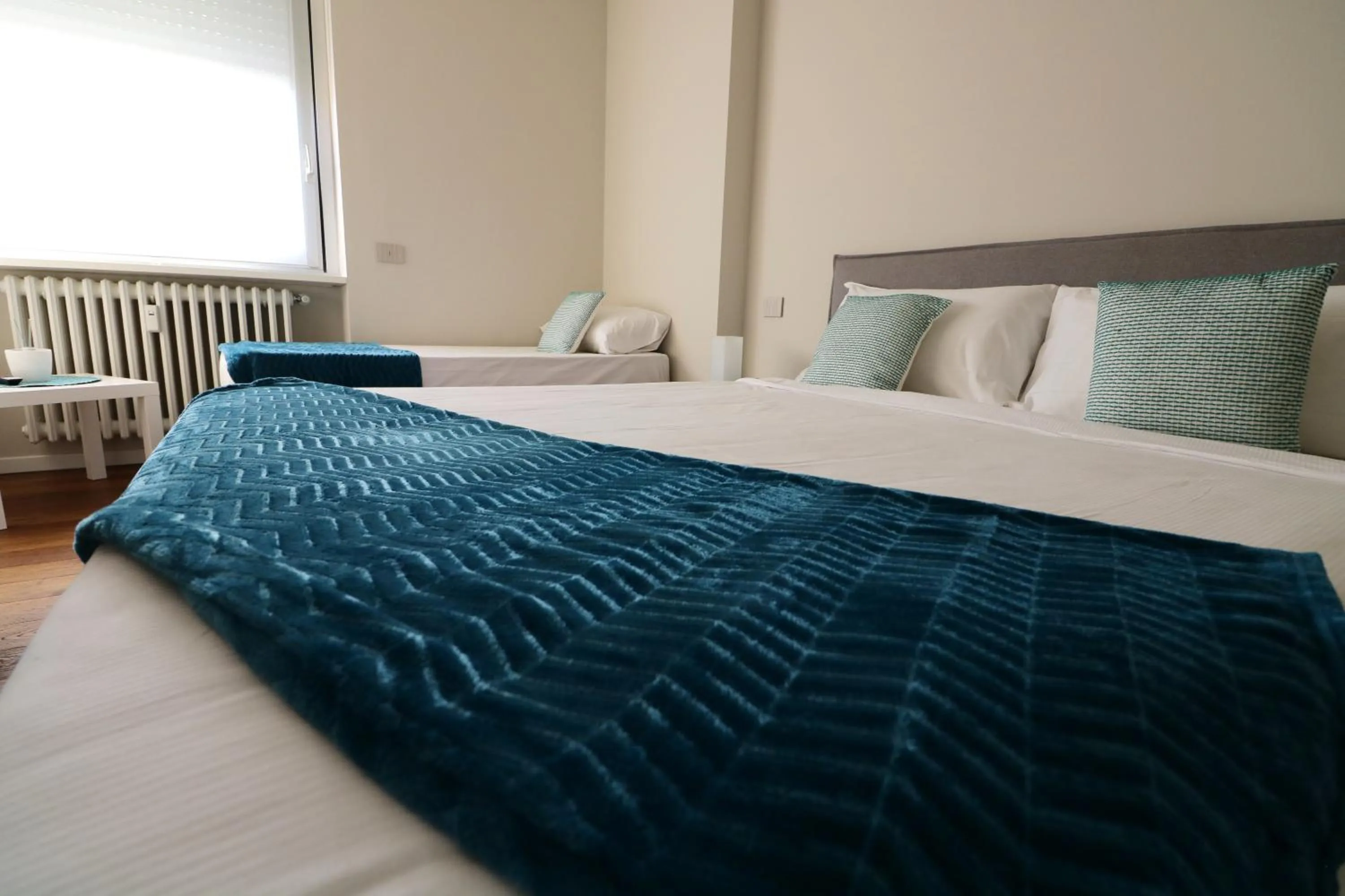 Bed in Aparthotel Isola