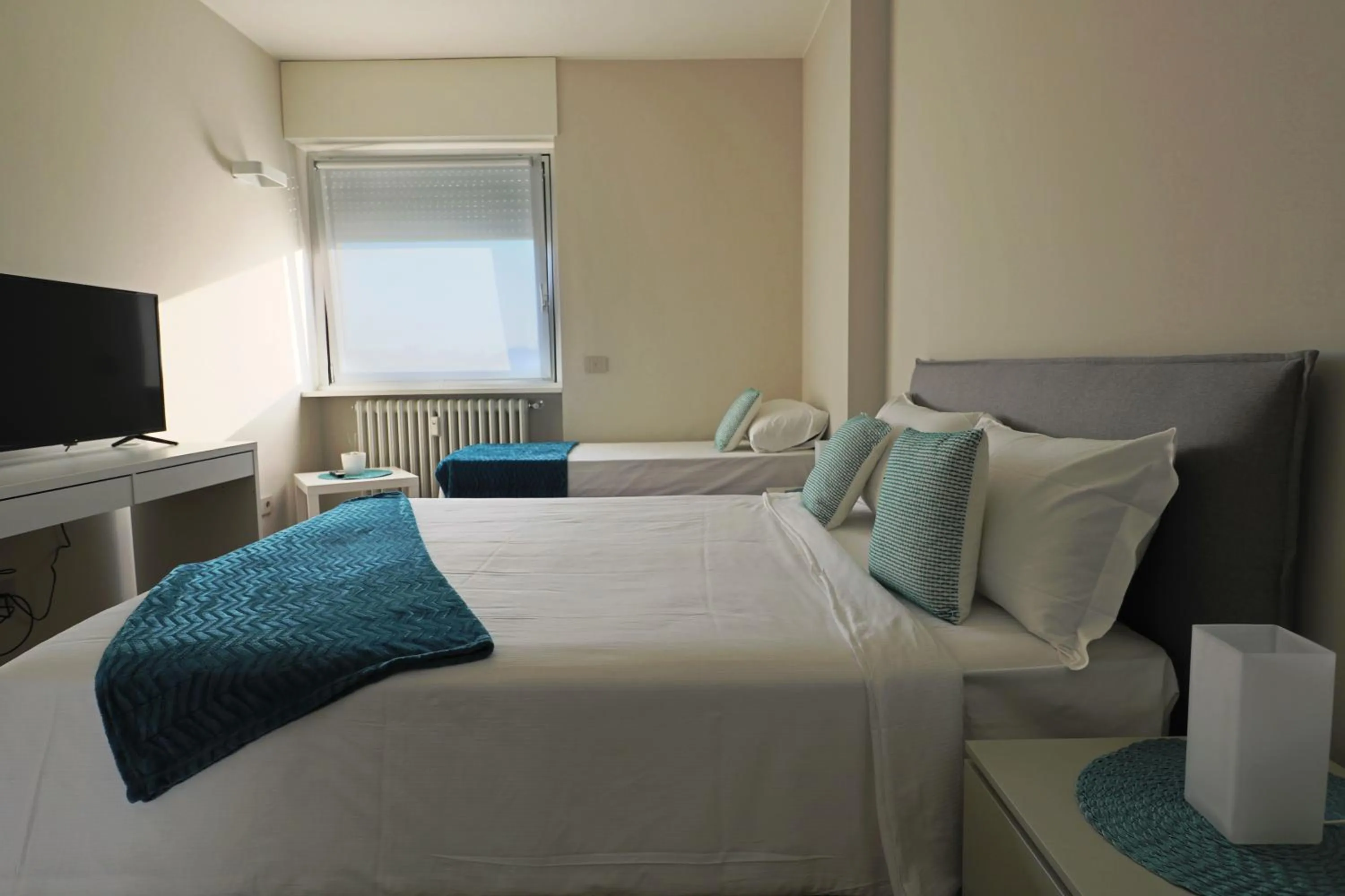 Bed in Aparthotel Isola