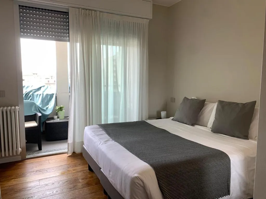 Bed in Aparthotel Isola