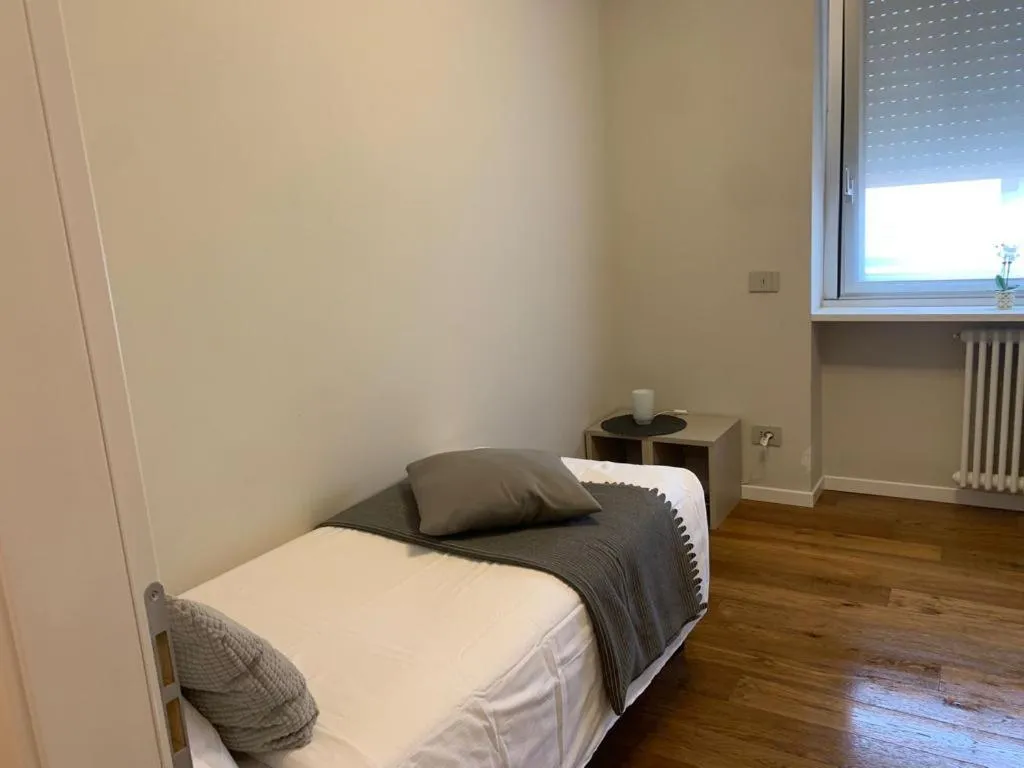 Bed in Aparthotel Isola