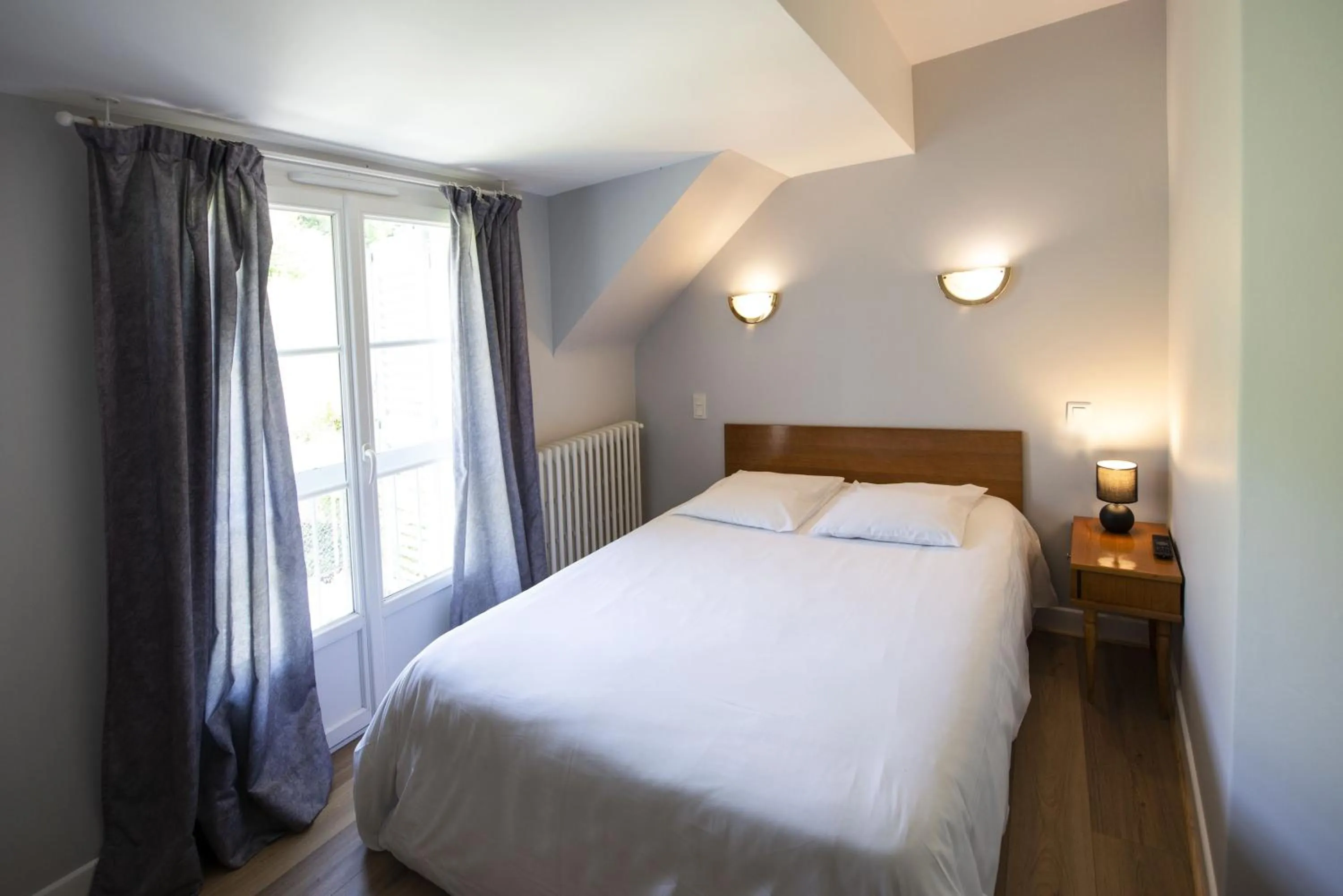 Bed in Hôtel des Barrages