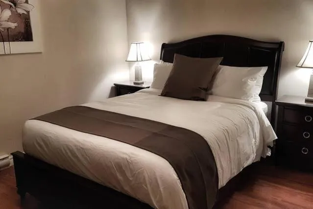 Bed in Two-Bedroom Apartment Sweet #4 by Amazing Property Rentals