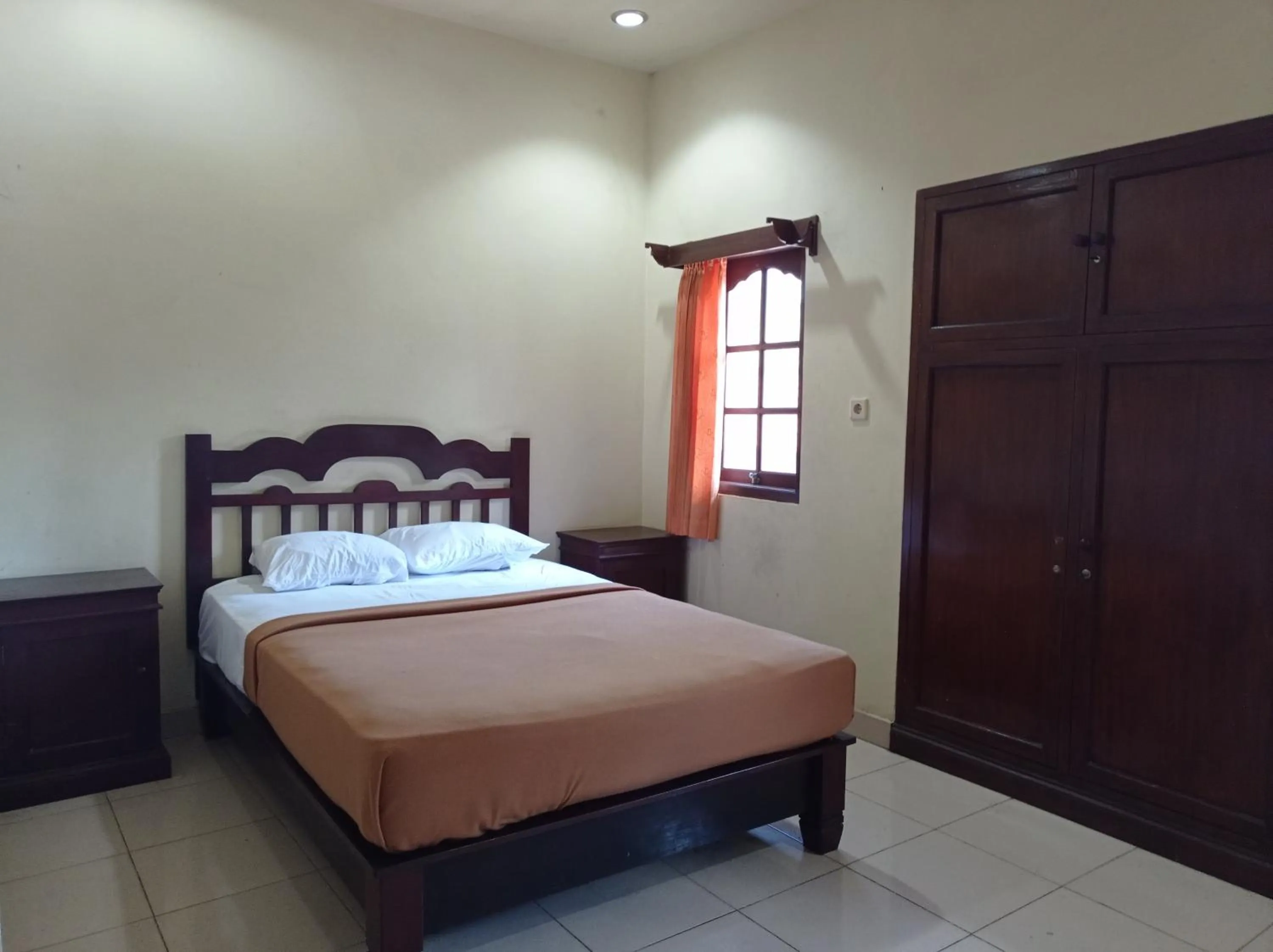 Bed in Hotel Mawar Sari Mitra RedDoorz