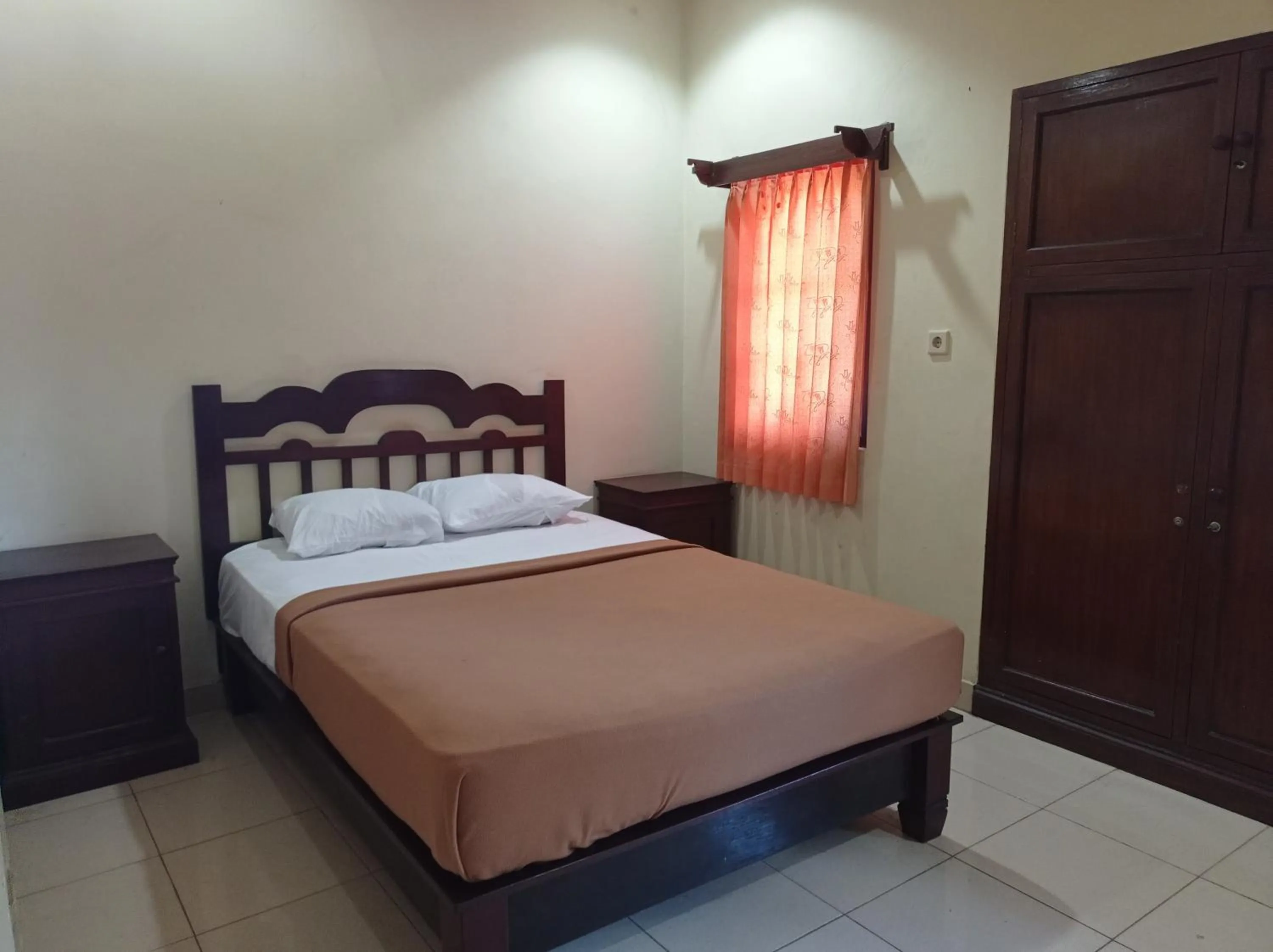 Bed in Hotel Mawar Sari Mitra RedDoorz