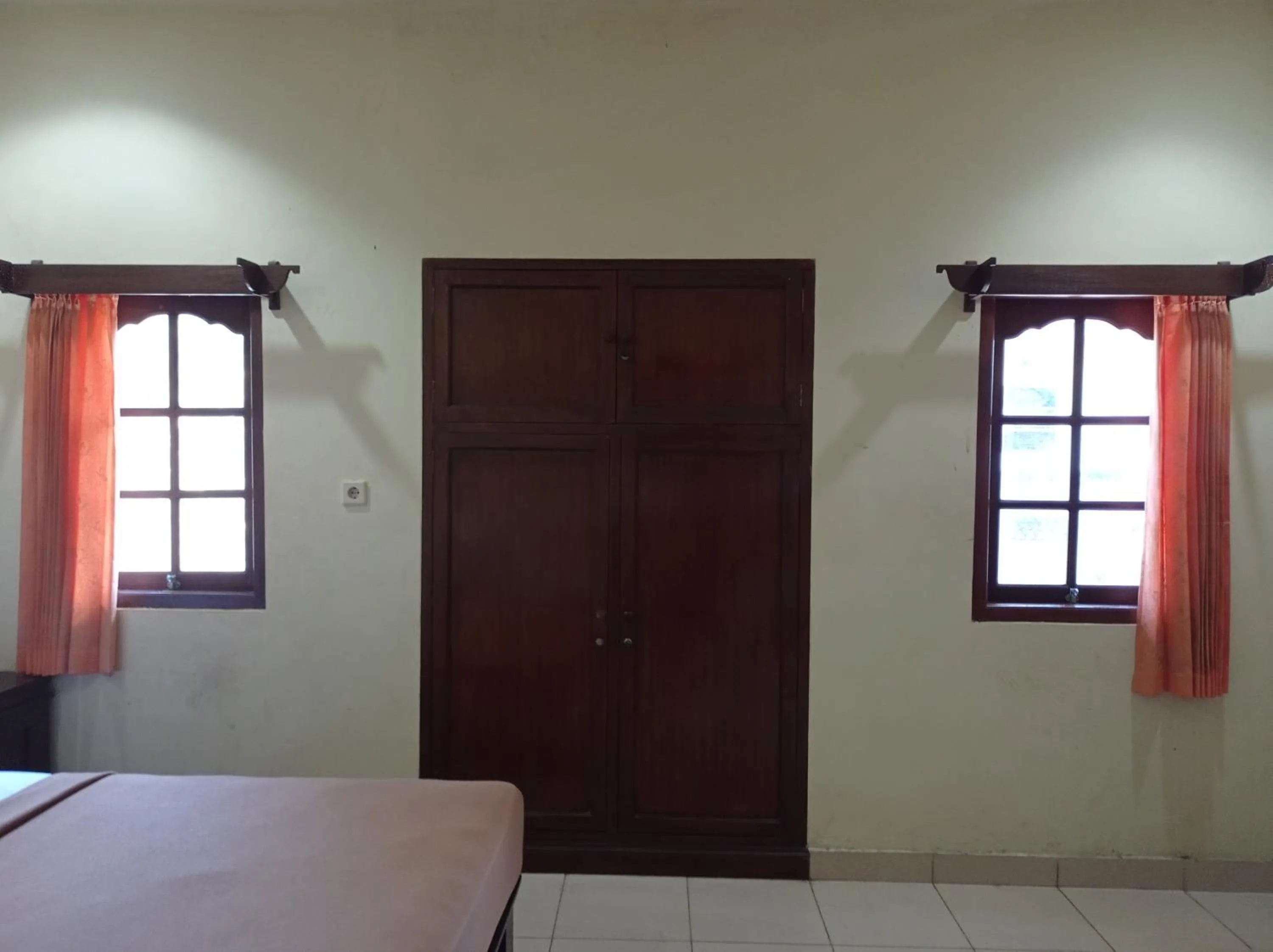 Bed in Hotel Mawar Sari Mitra RedDoorz