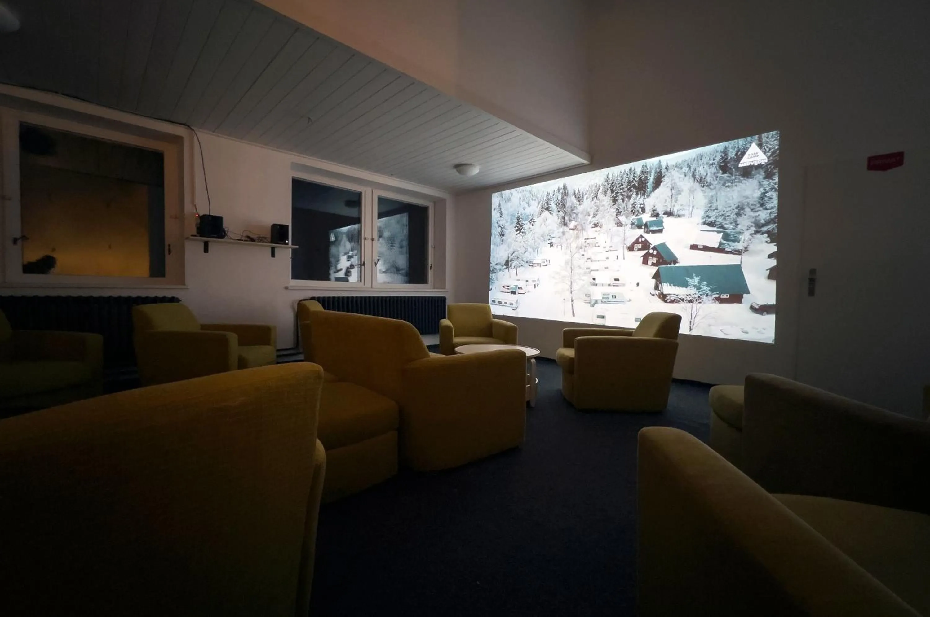 Communal lounge/ TV room in Hotel Horní Pramen