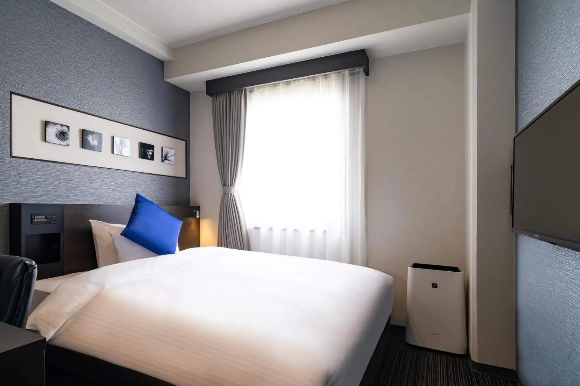 Photo of the whole room, Bed in Goi Grand Hotel