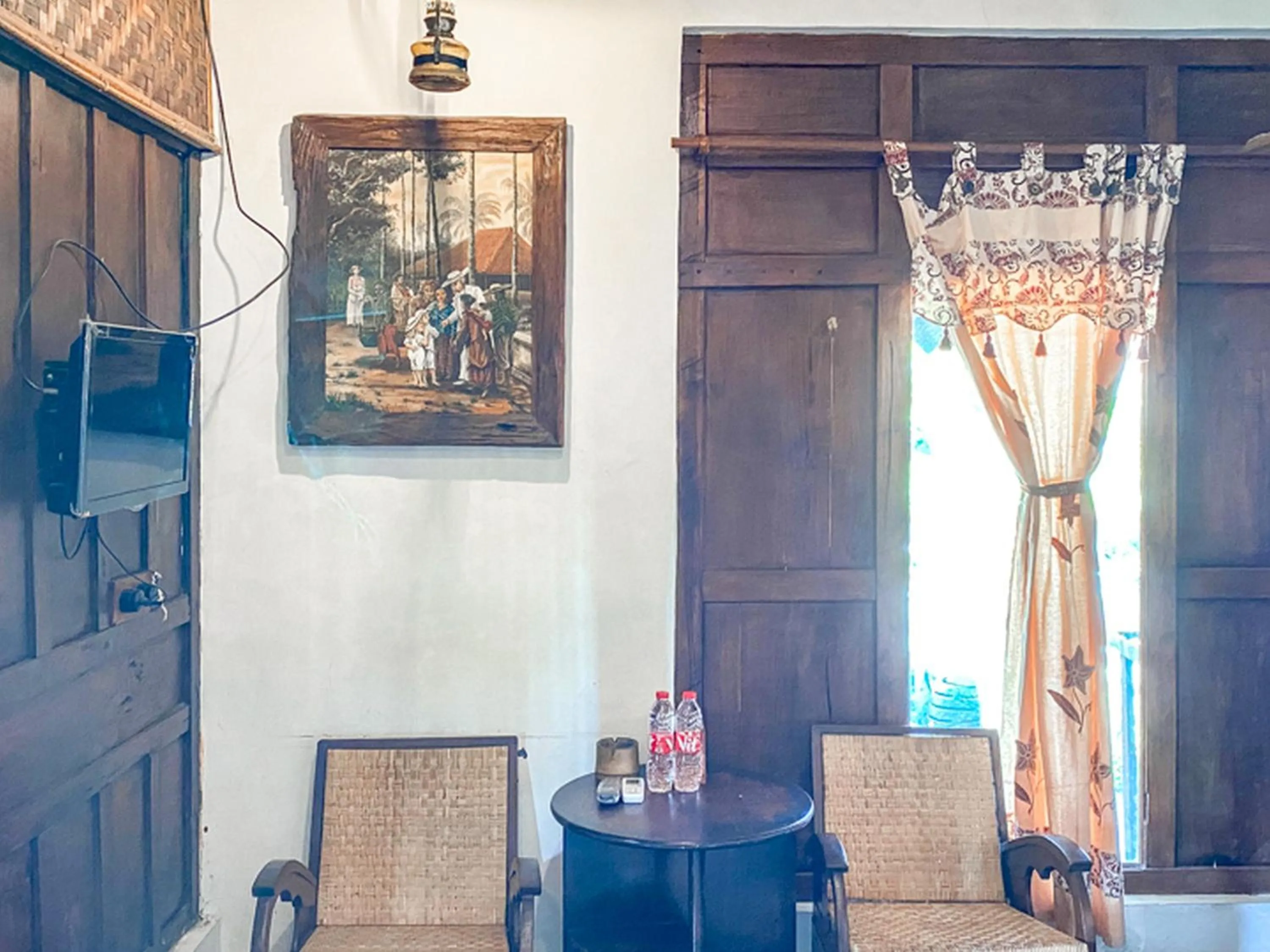 Seating area in Griya Gribig Guest House Mitra RedDoorz