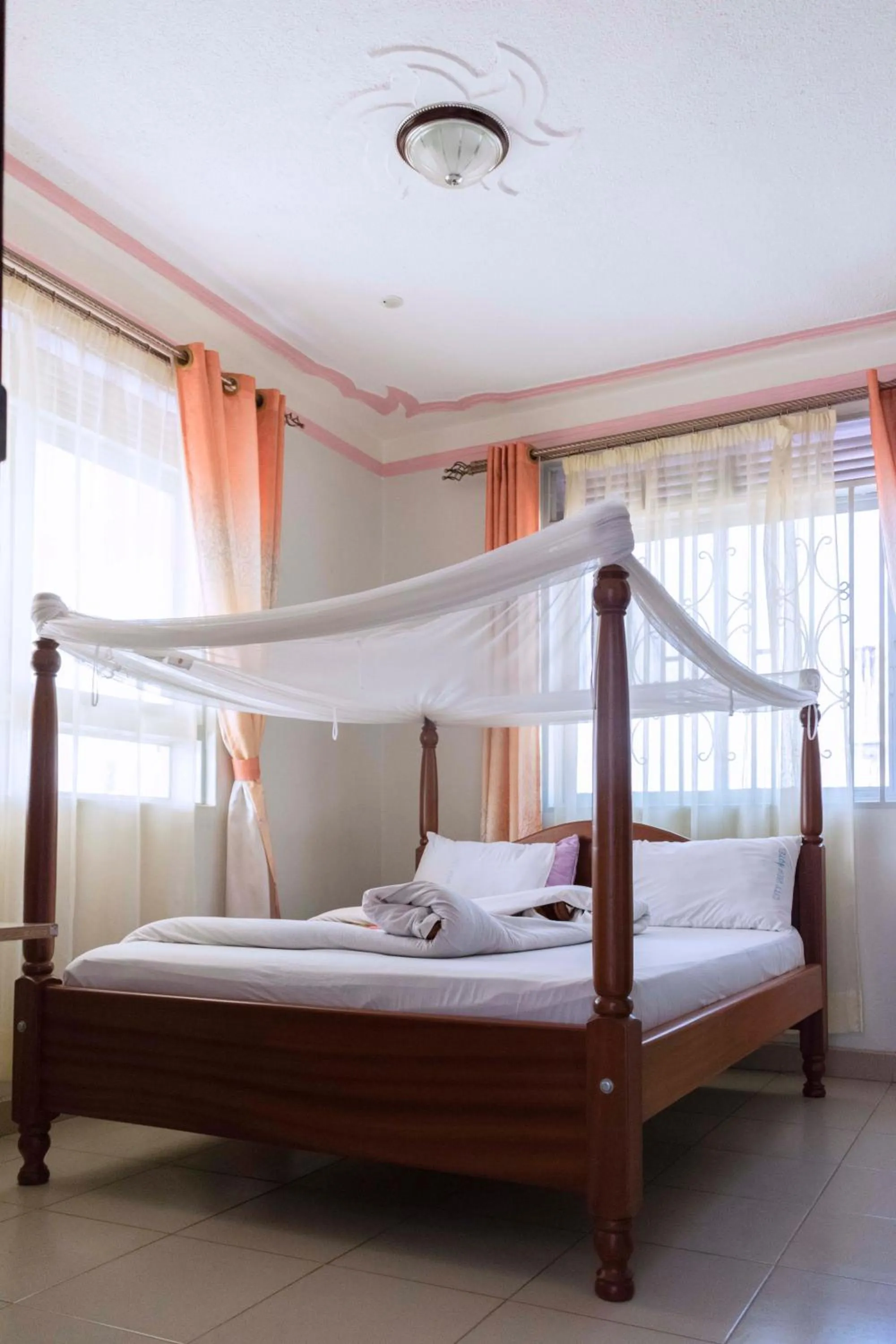 Bed in Relief Motel Fort Portal