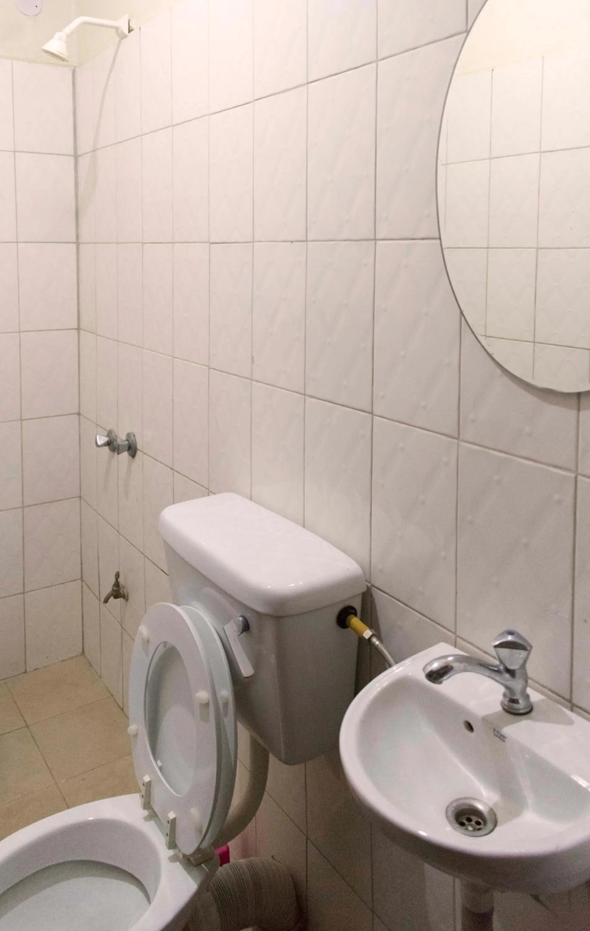 Toilet in Relief Motel Fort Portal