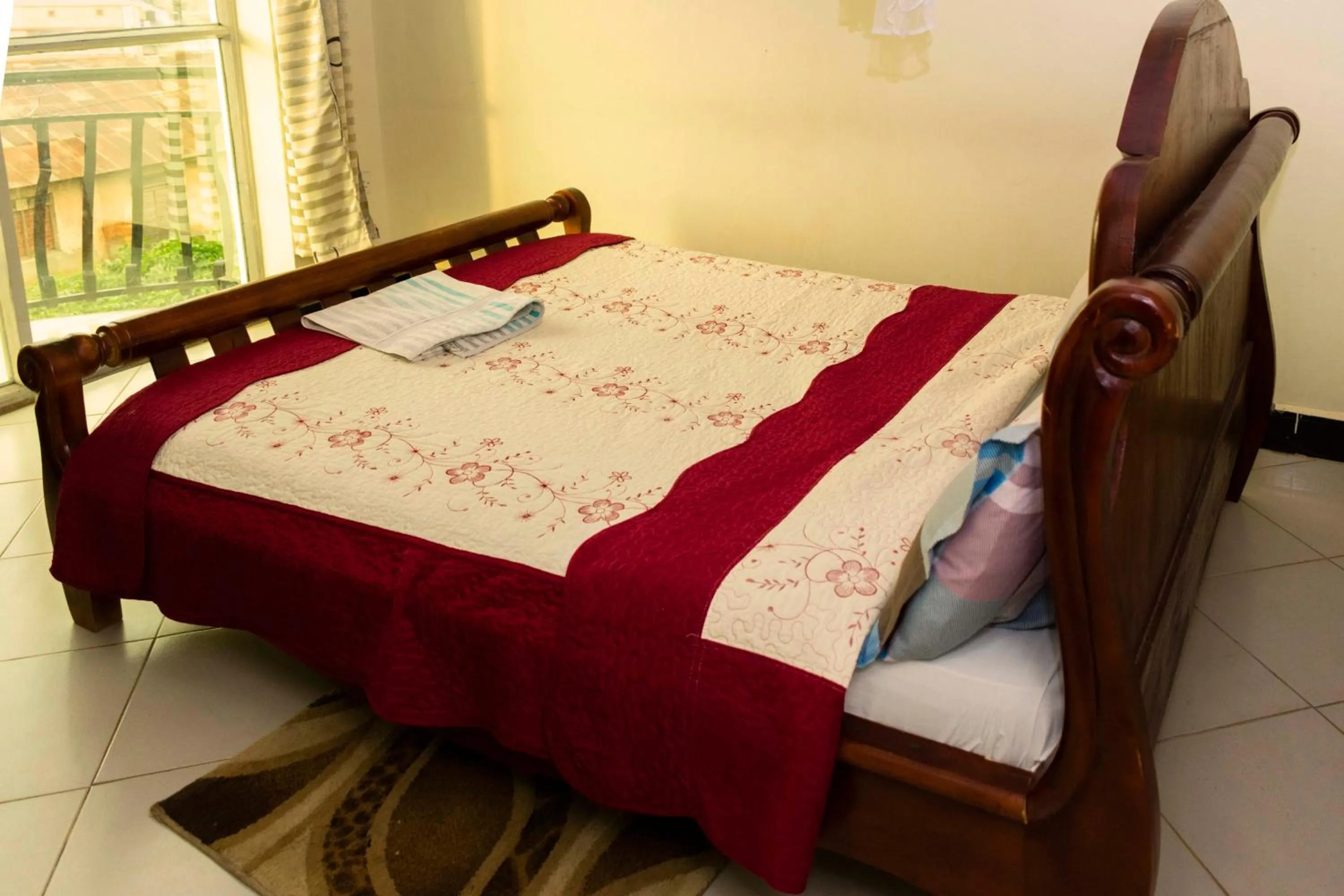 Bed in Relief Motel Fort Portal