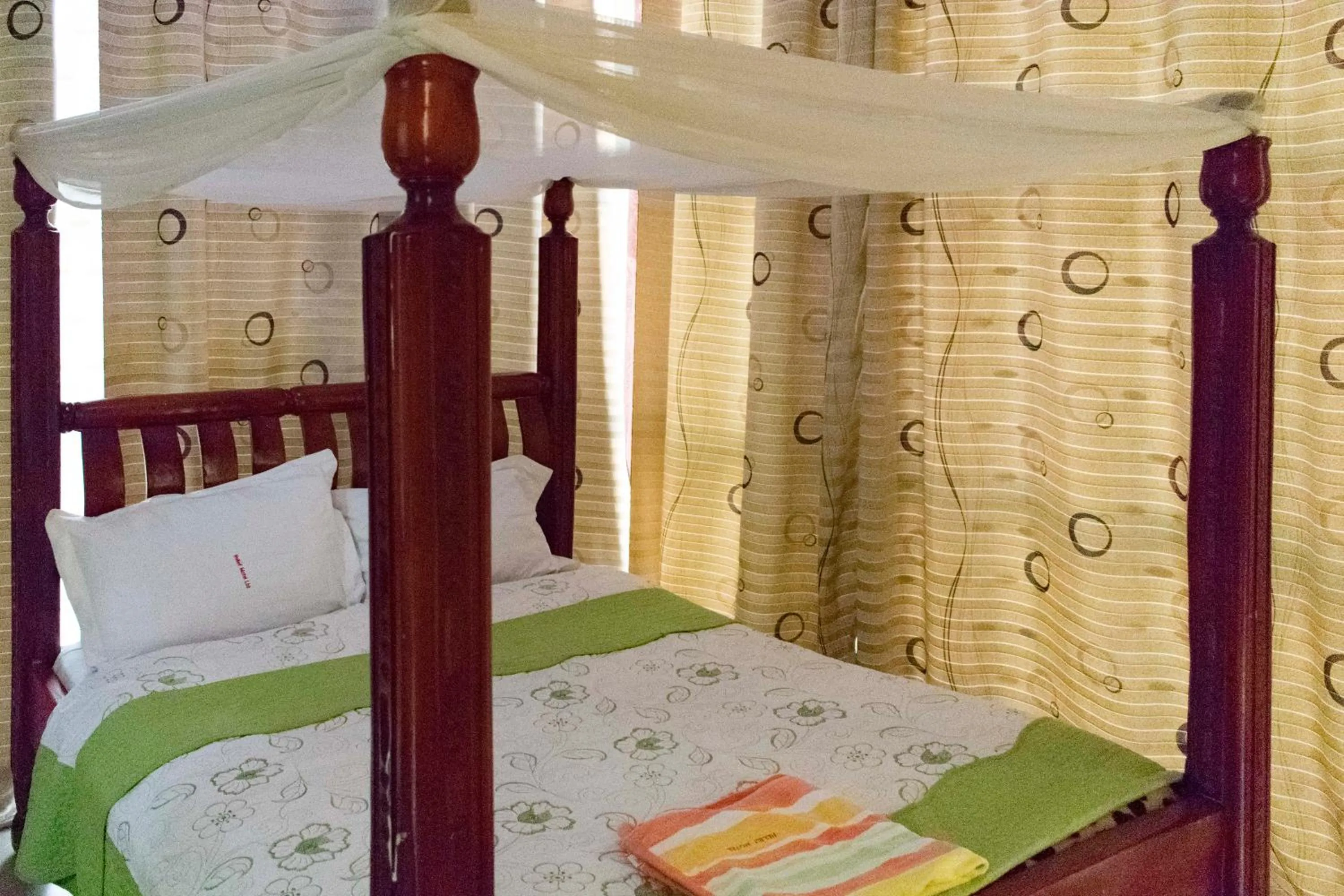 Bed in Relief Motel Fort Portal