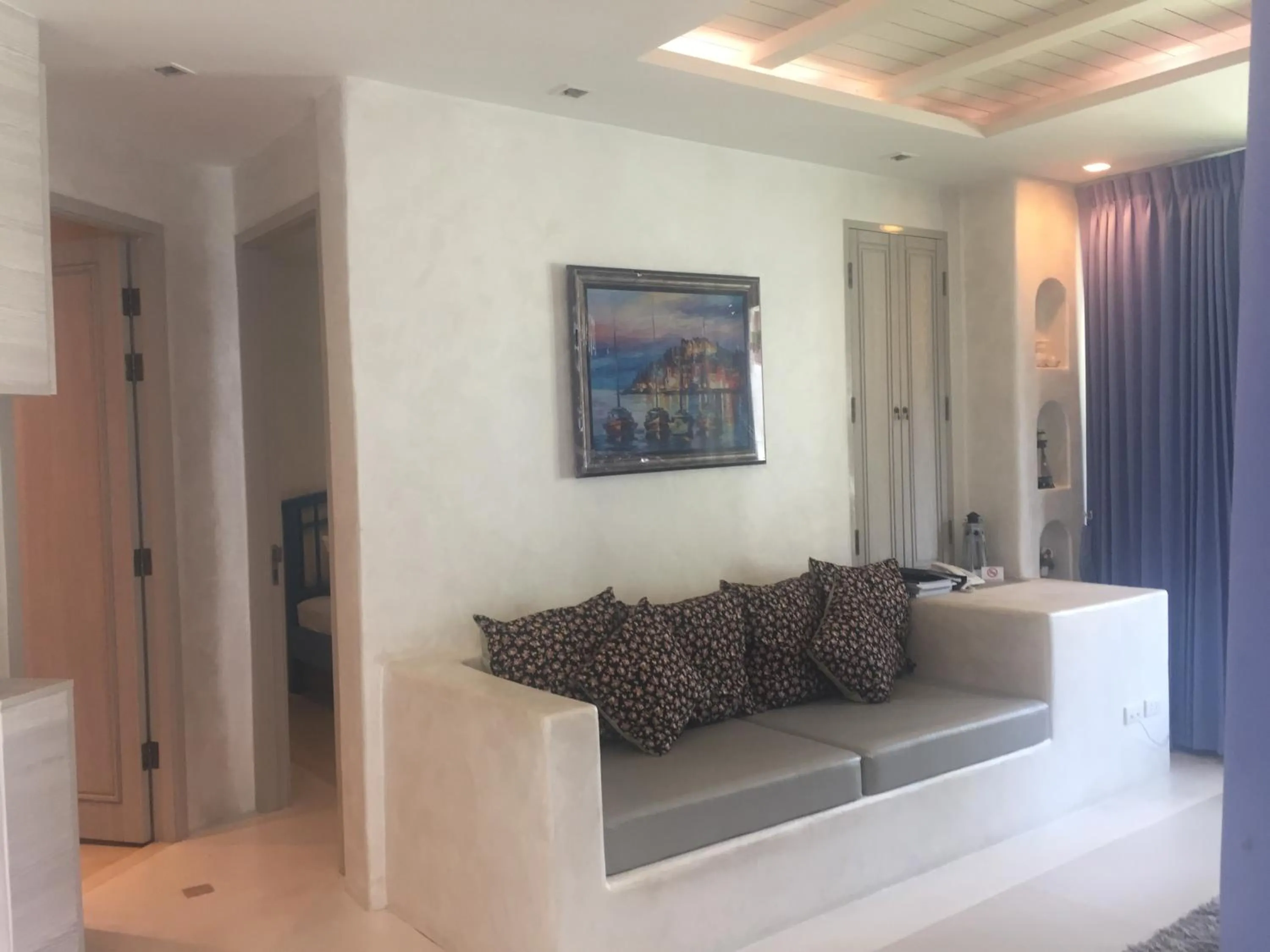 Living room in The Chelona pool access by Away