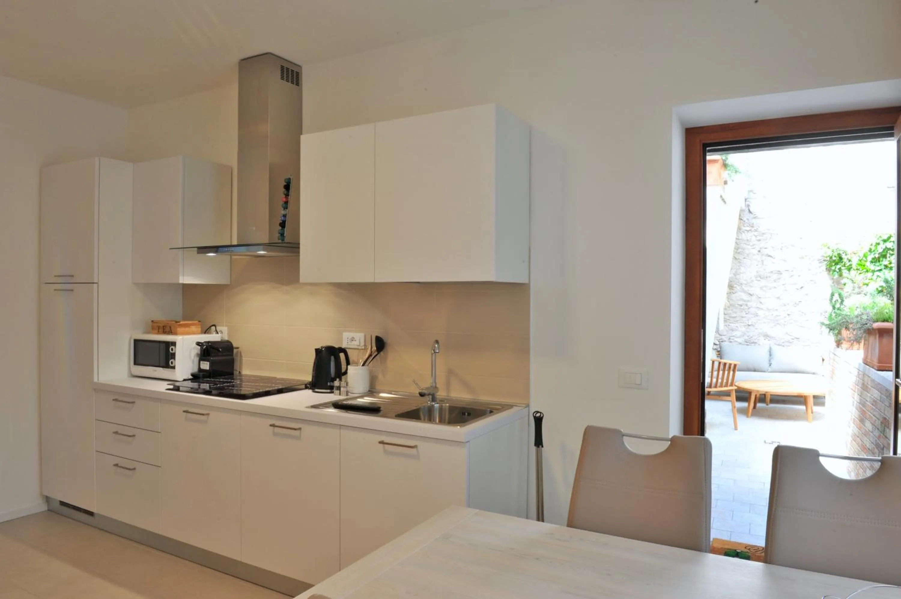 Kitchen or kitchenette in Bella Vacanza Limone