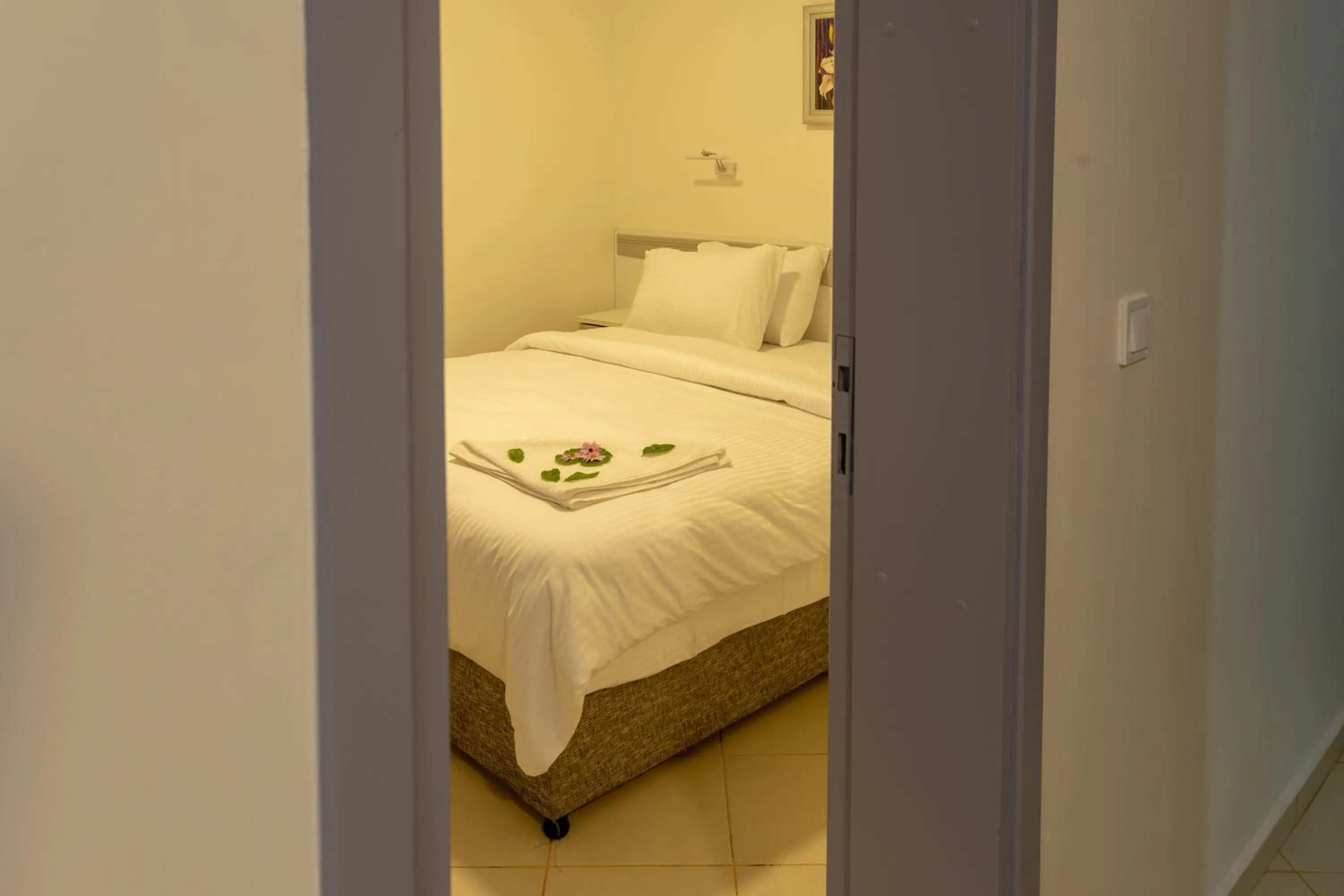 Bed in Mitos Apartments