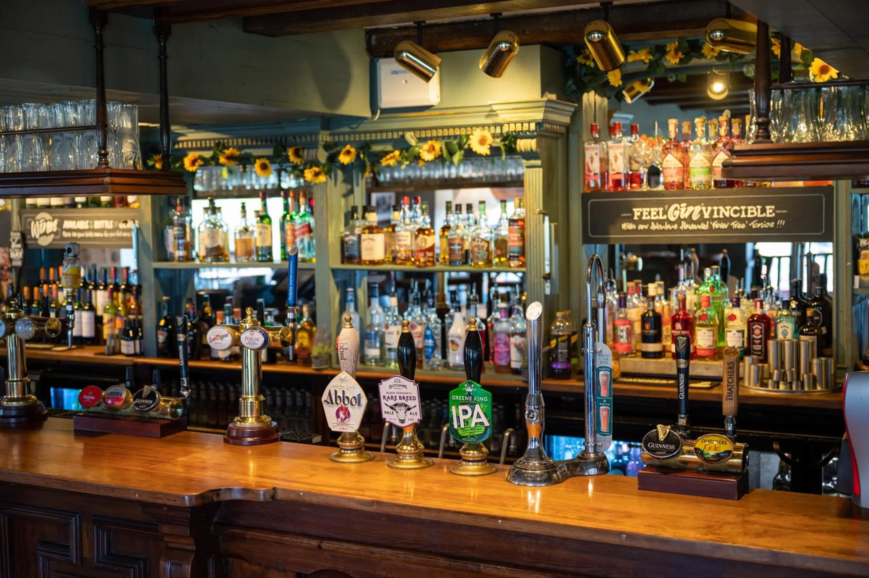 Lounge or bar in Rising Sun Hotel by Greene King Inns