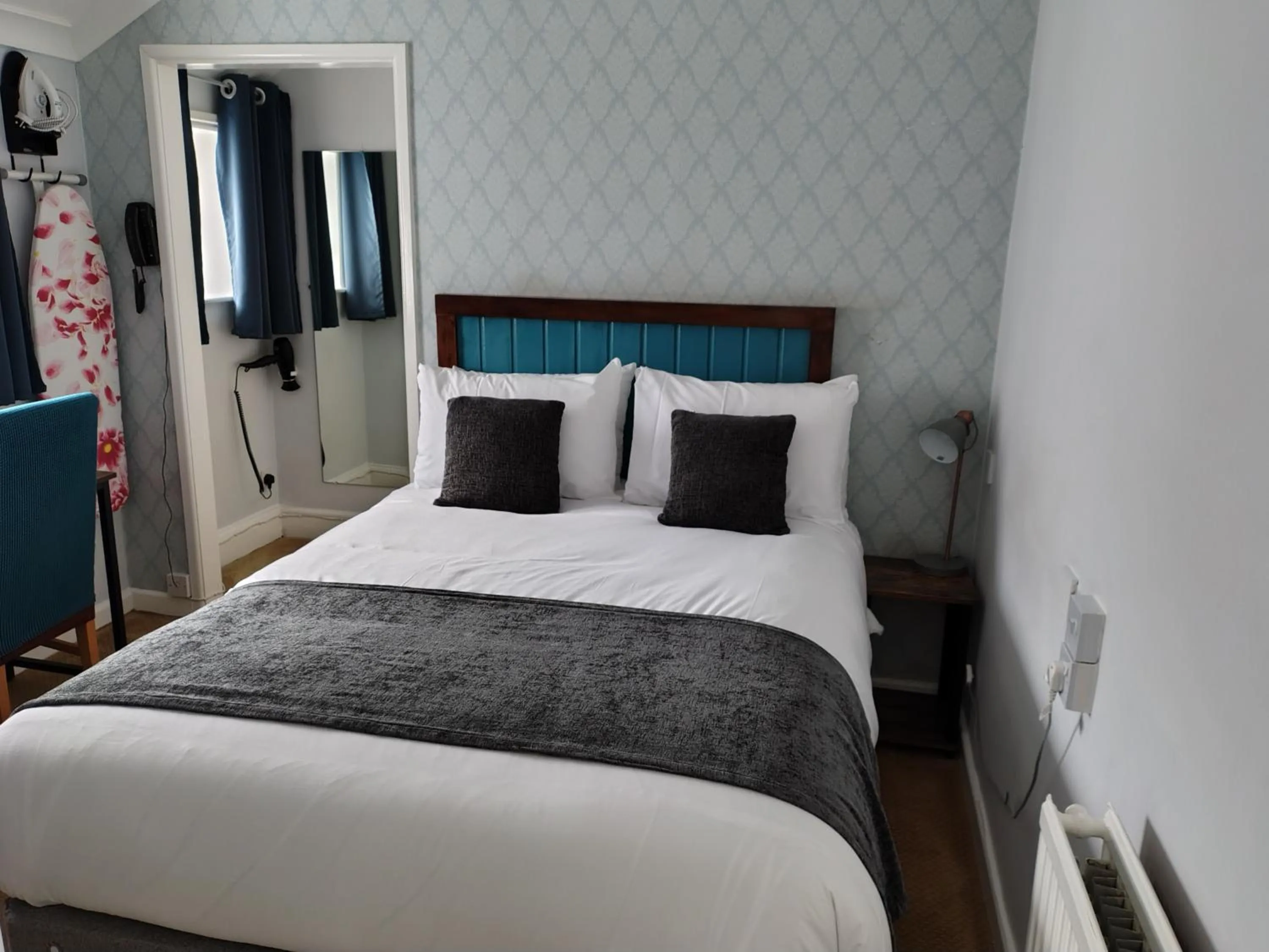 Bed in Rising Sun Hotel by Greene King Inns