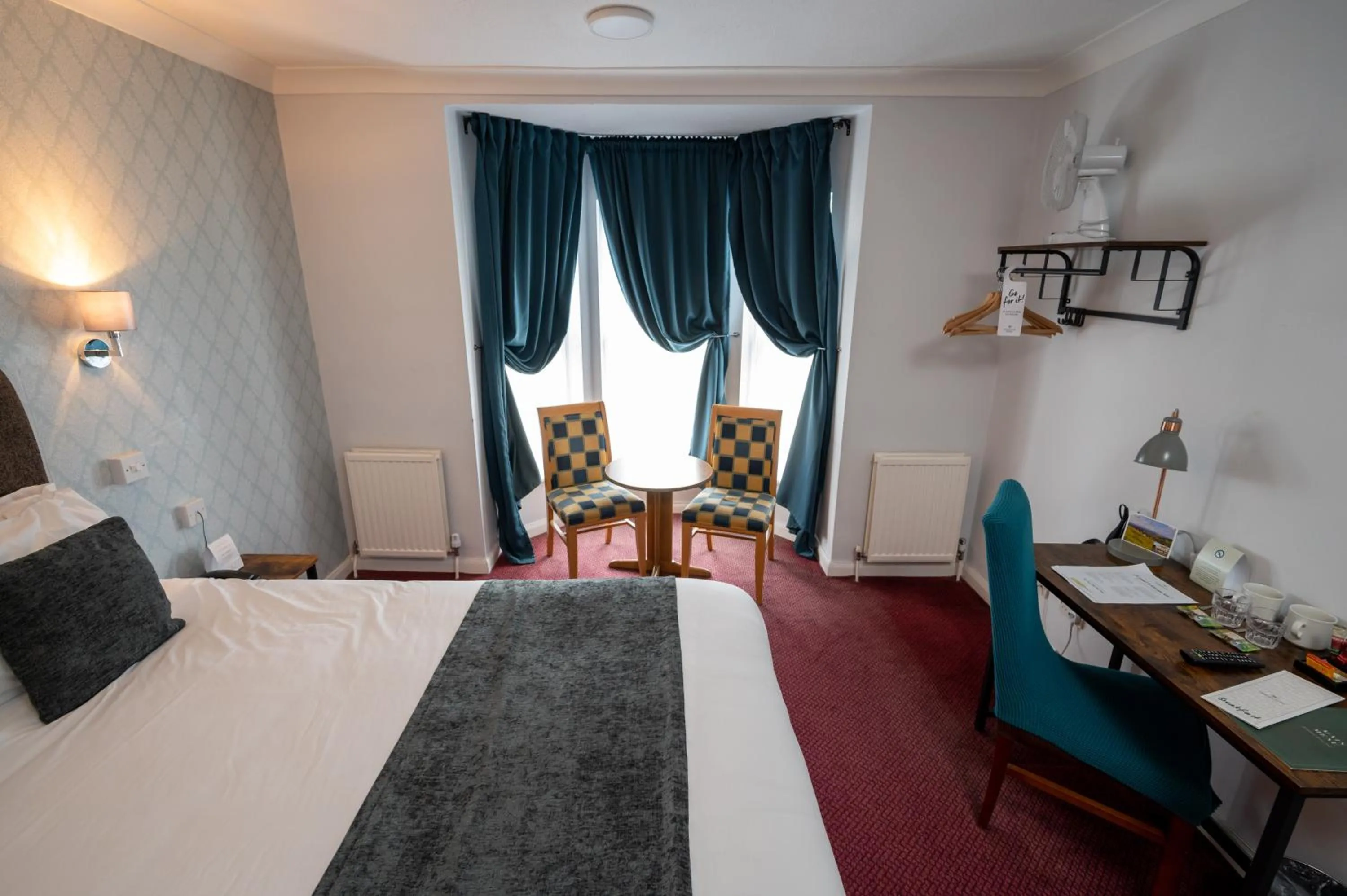 Seating area, Bed in Rising Sun Hotel by Greene King Inns