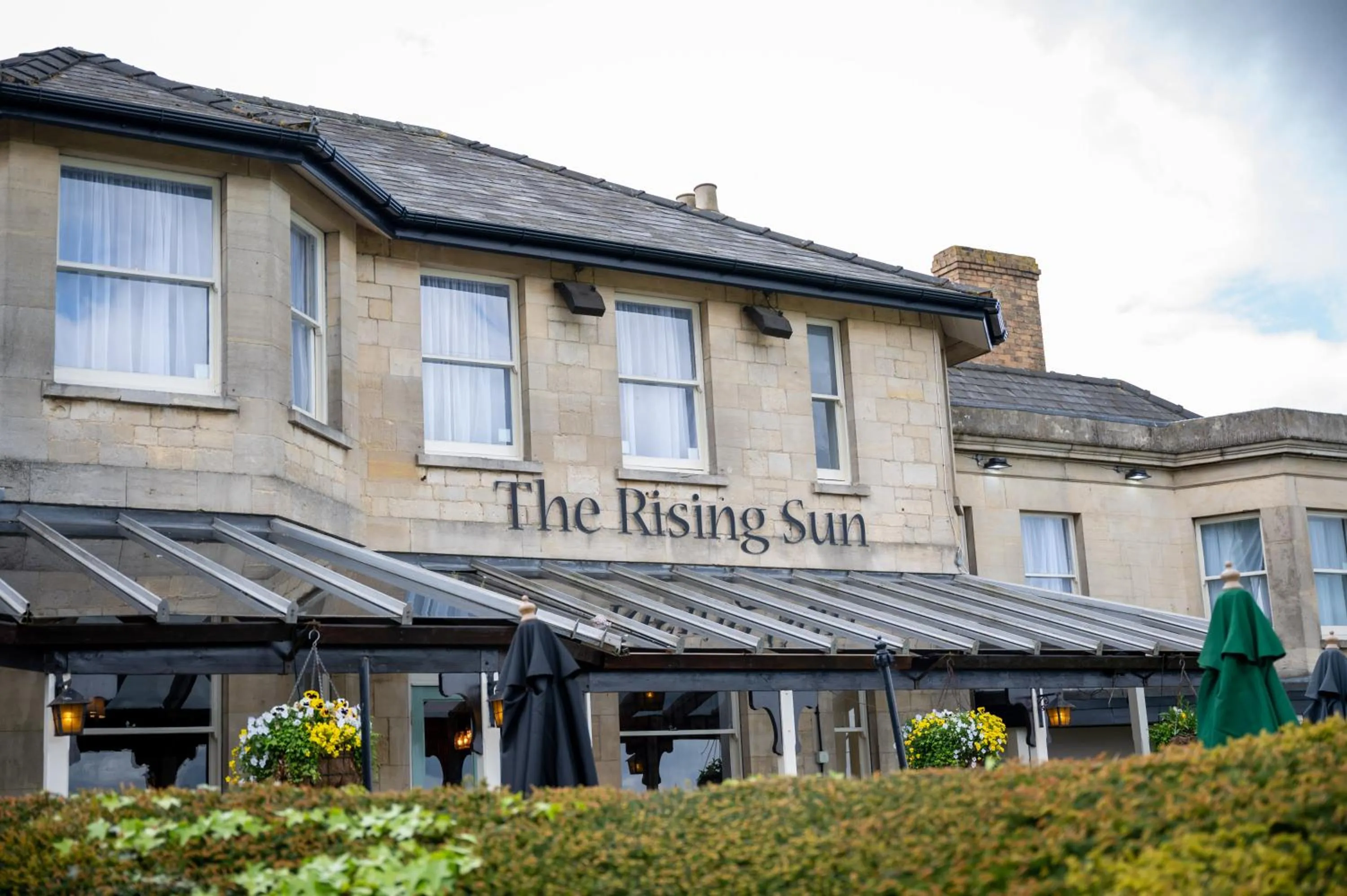 Property building in Rising Sun Hotel by Greene King Inns