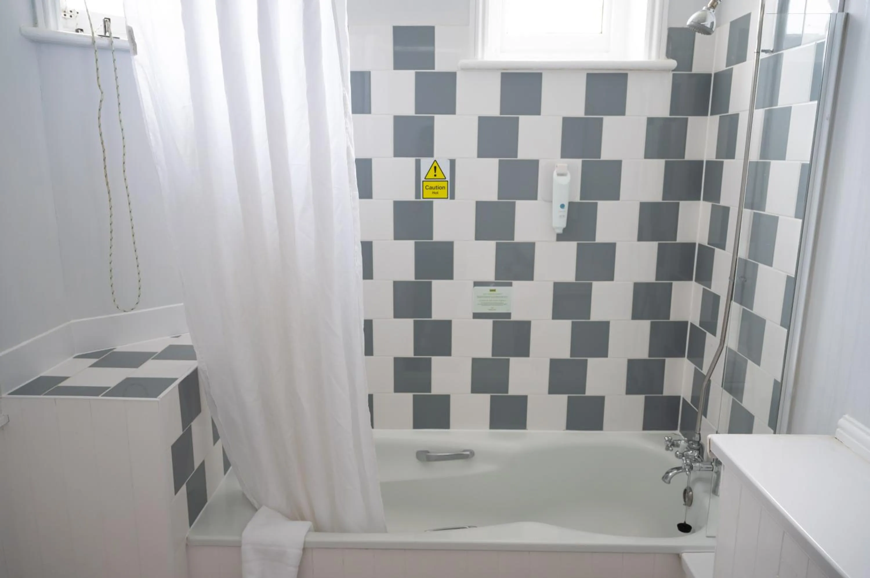 Bathroom in Rising Sun Hotel by Greene King Inns