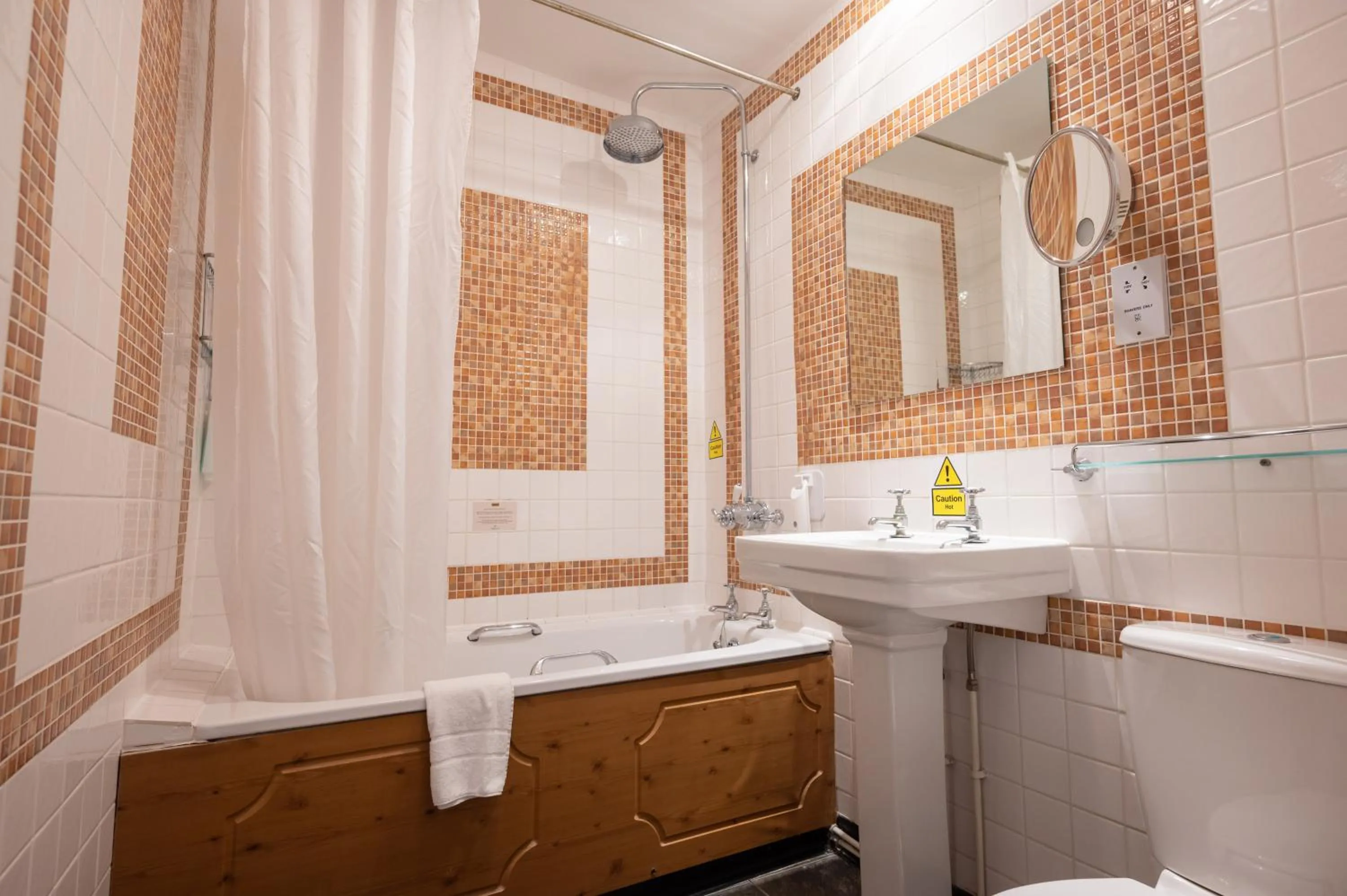Bathroom in Rising Sun Hotel by Greene King Inns