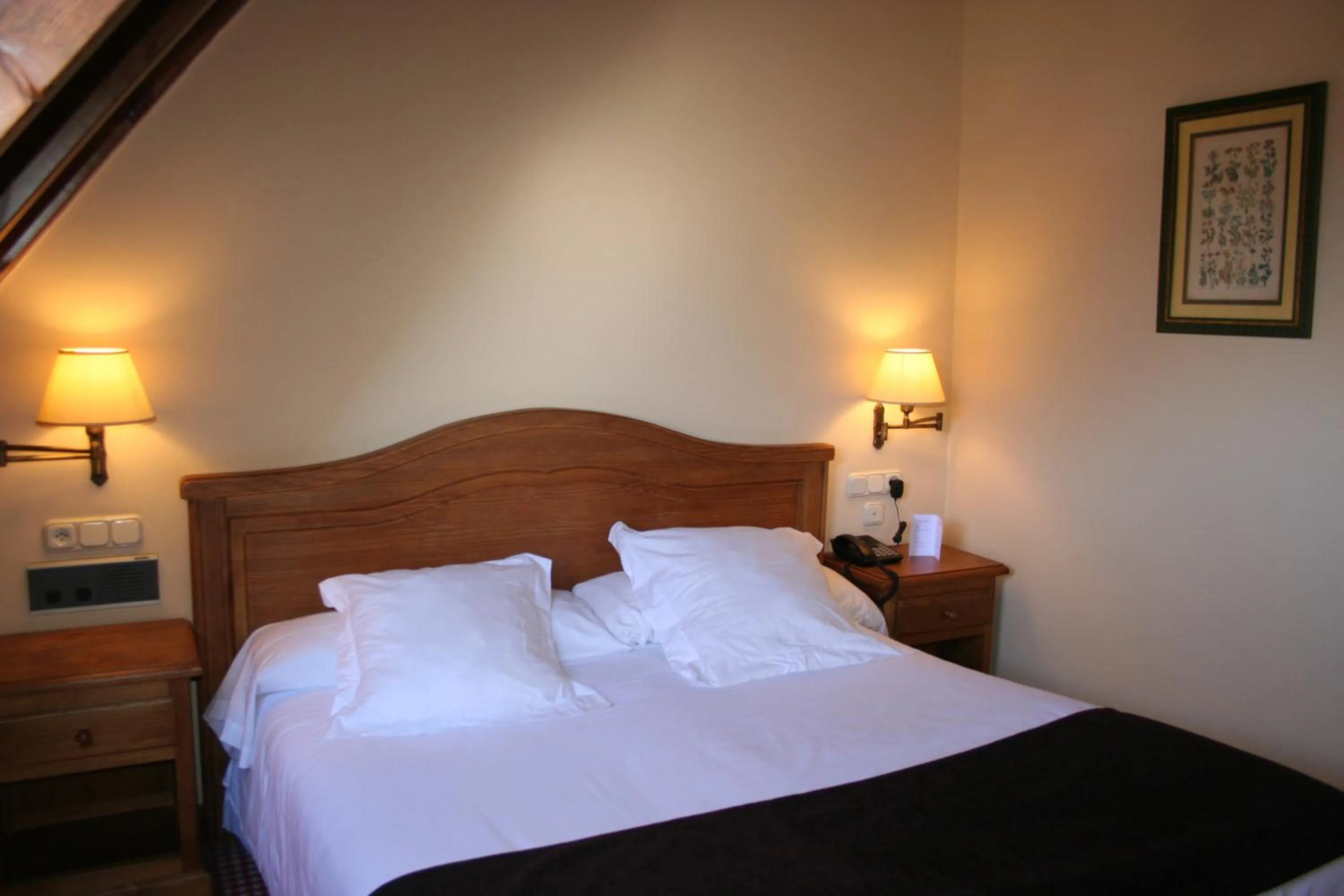 Bed in Hotel Chalet Bassibe