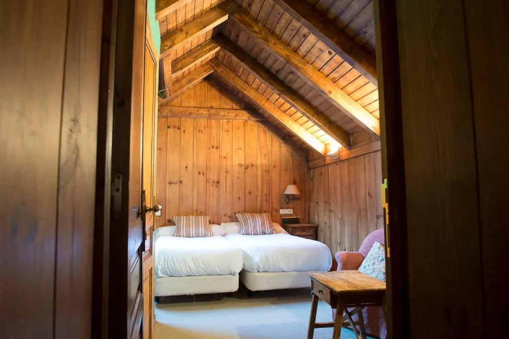 Bed in Hotel Chalet Bassibe