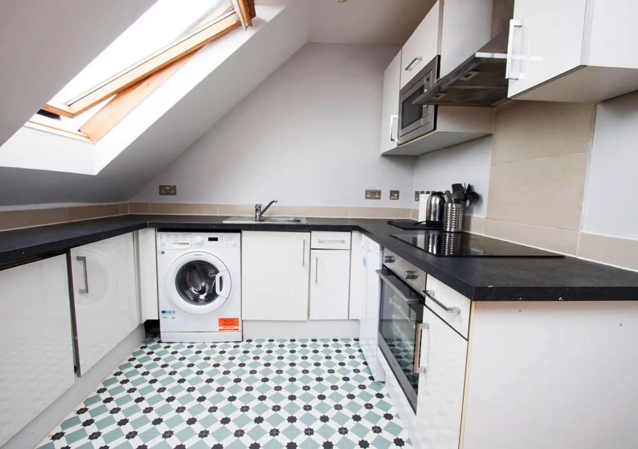 Kitchen or kitchenette in Westciti Caroco Aparthotel