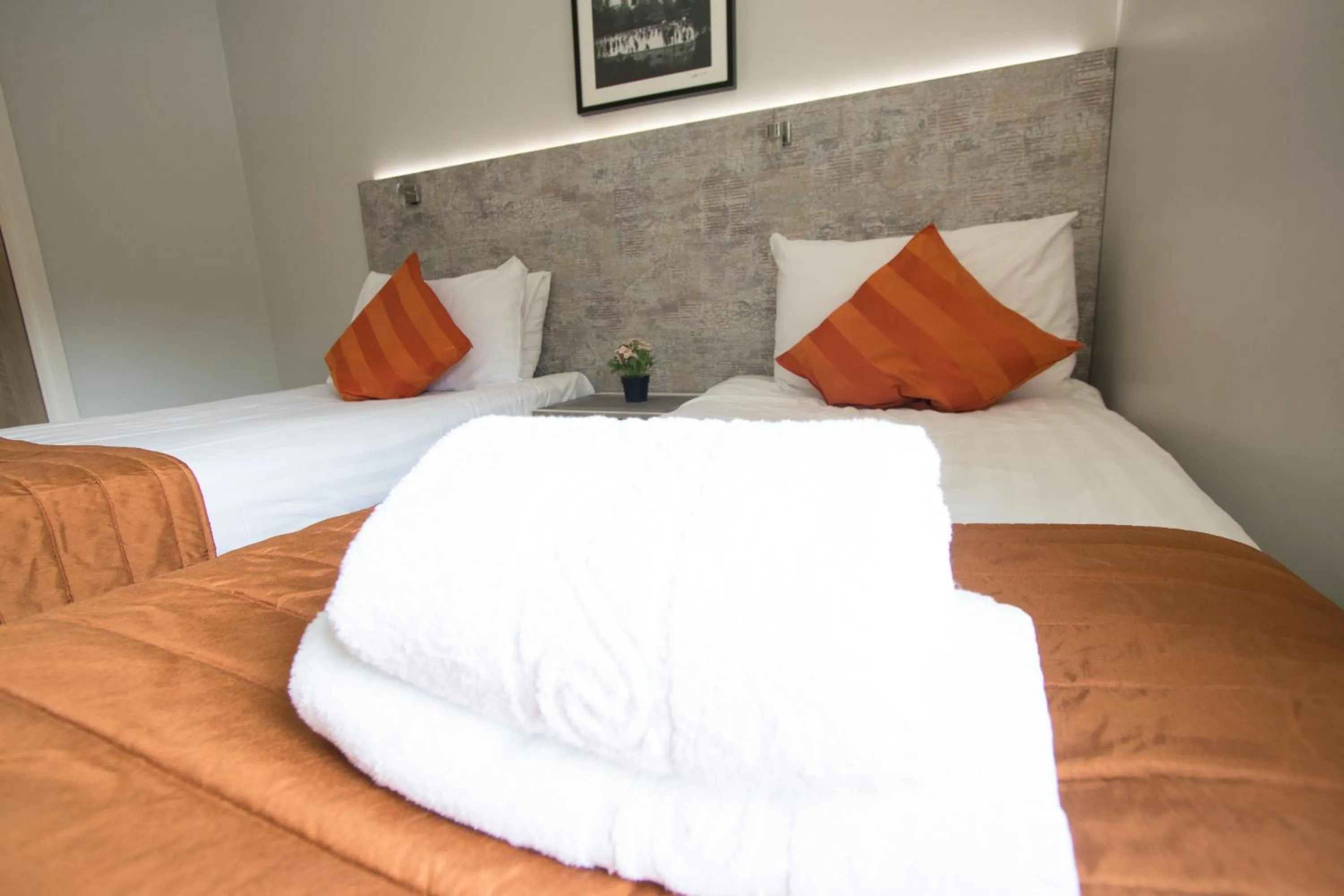 Bed in Westciti Caroco Aparthotel