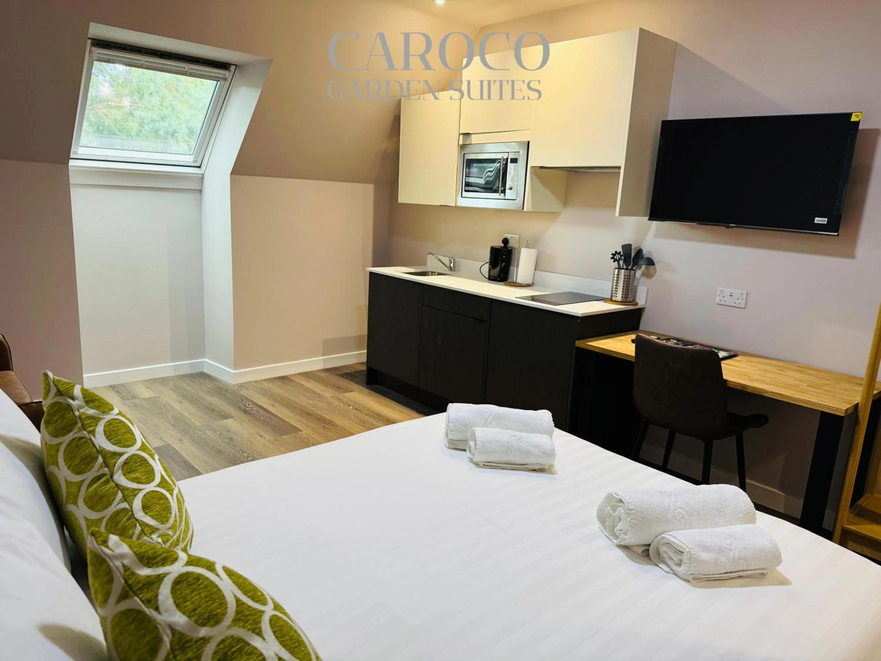 Bed in Westciti Caroco Aparthotel