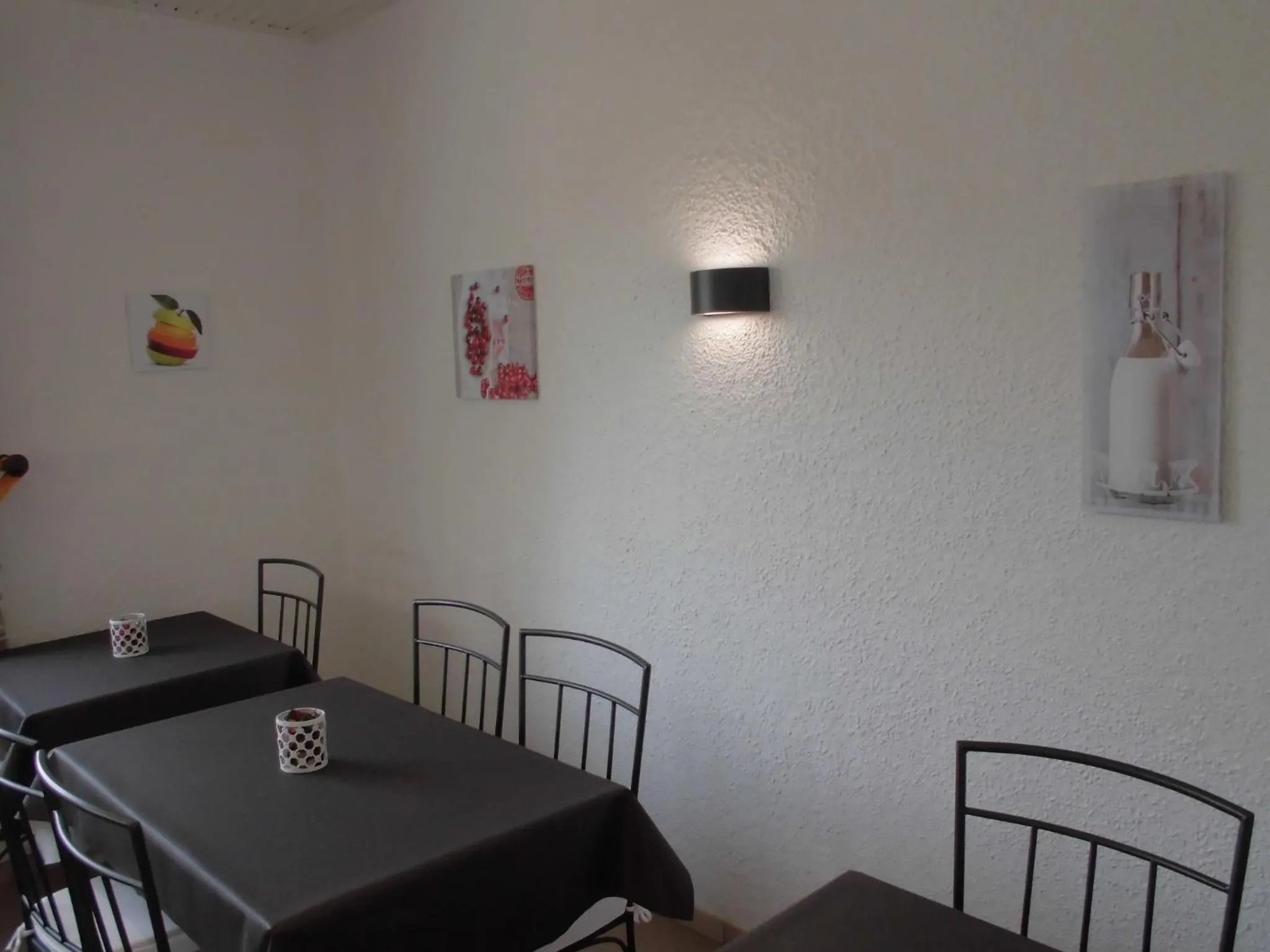 Dining area in Cit'Hotel Le Challans