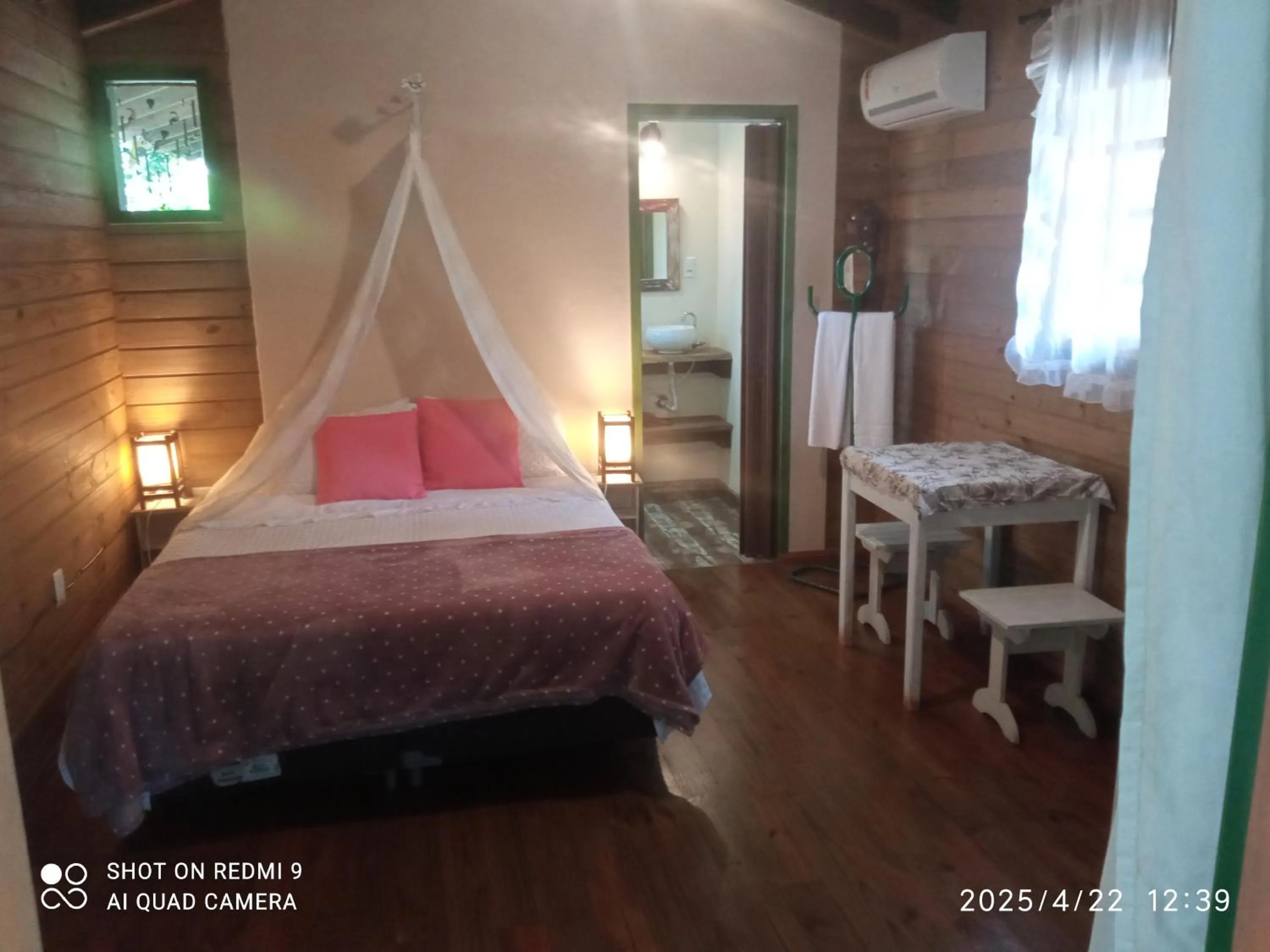 Bed in Pousada Refúgio dos Pássaros