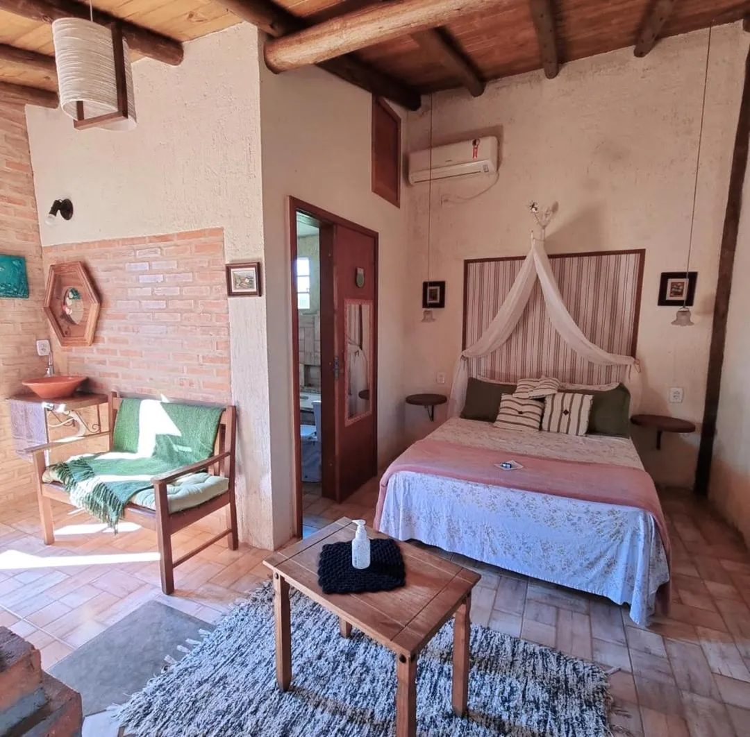 Bed in Pousada Refúgio dos Pássaros