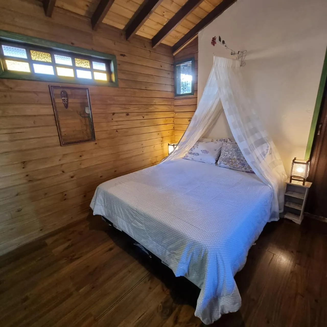 Bed in Pousada Refúgio dos Pássaros