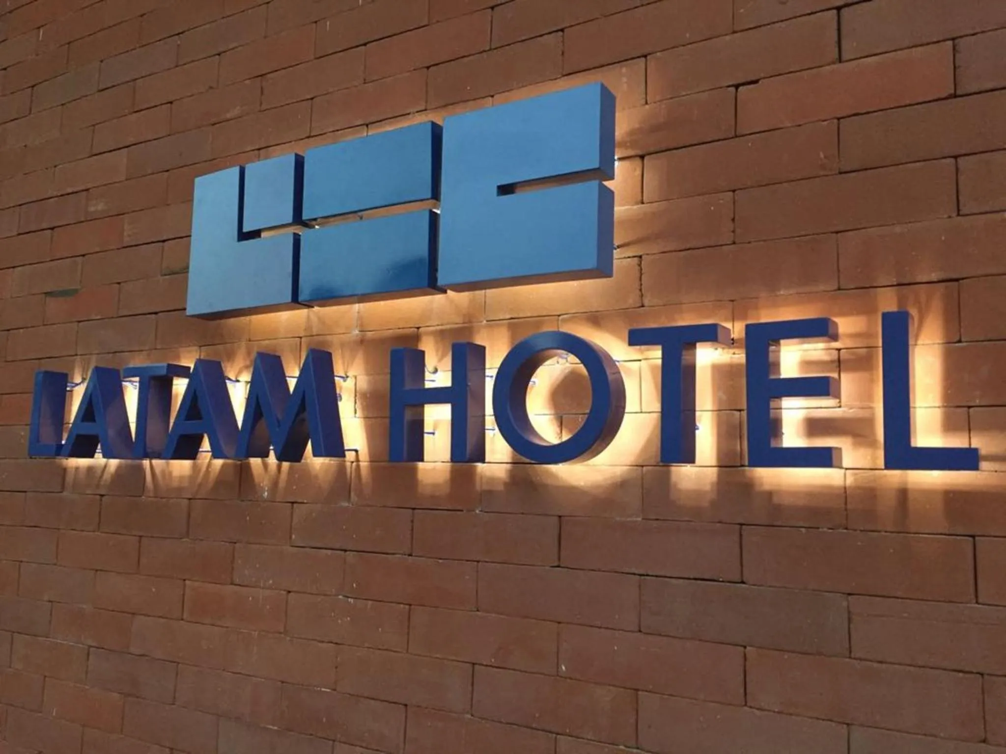 Property logo or sign in LATAM HOTEL Plaza Pradera Quetzaltenango