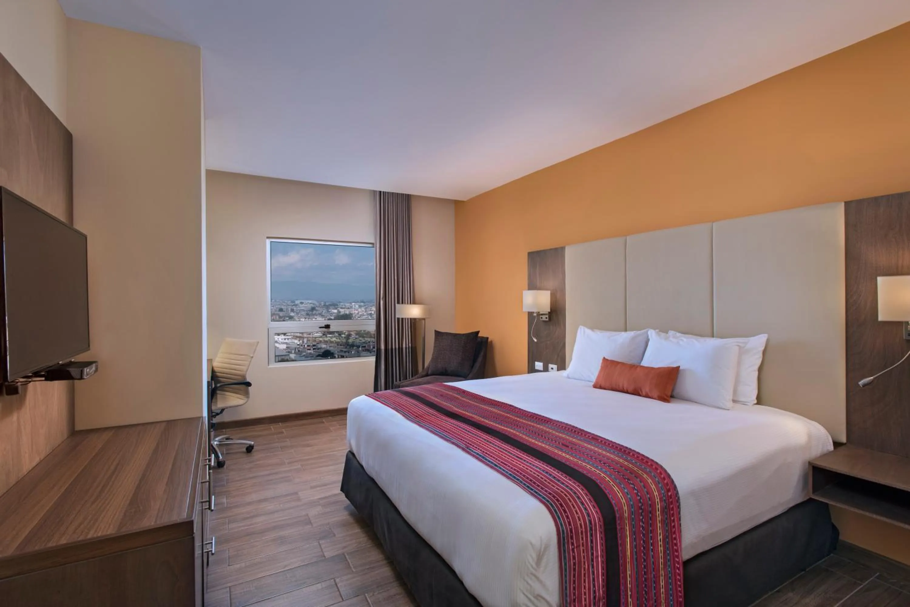 Bedroom, Bed in LATAM HOTEL Plaza Pradera Quetzaltenango