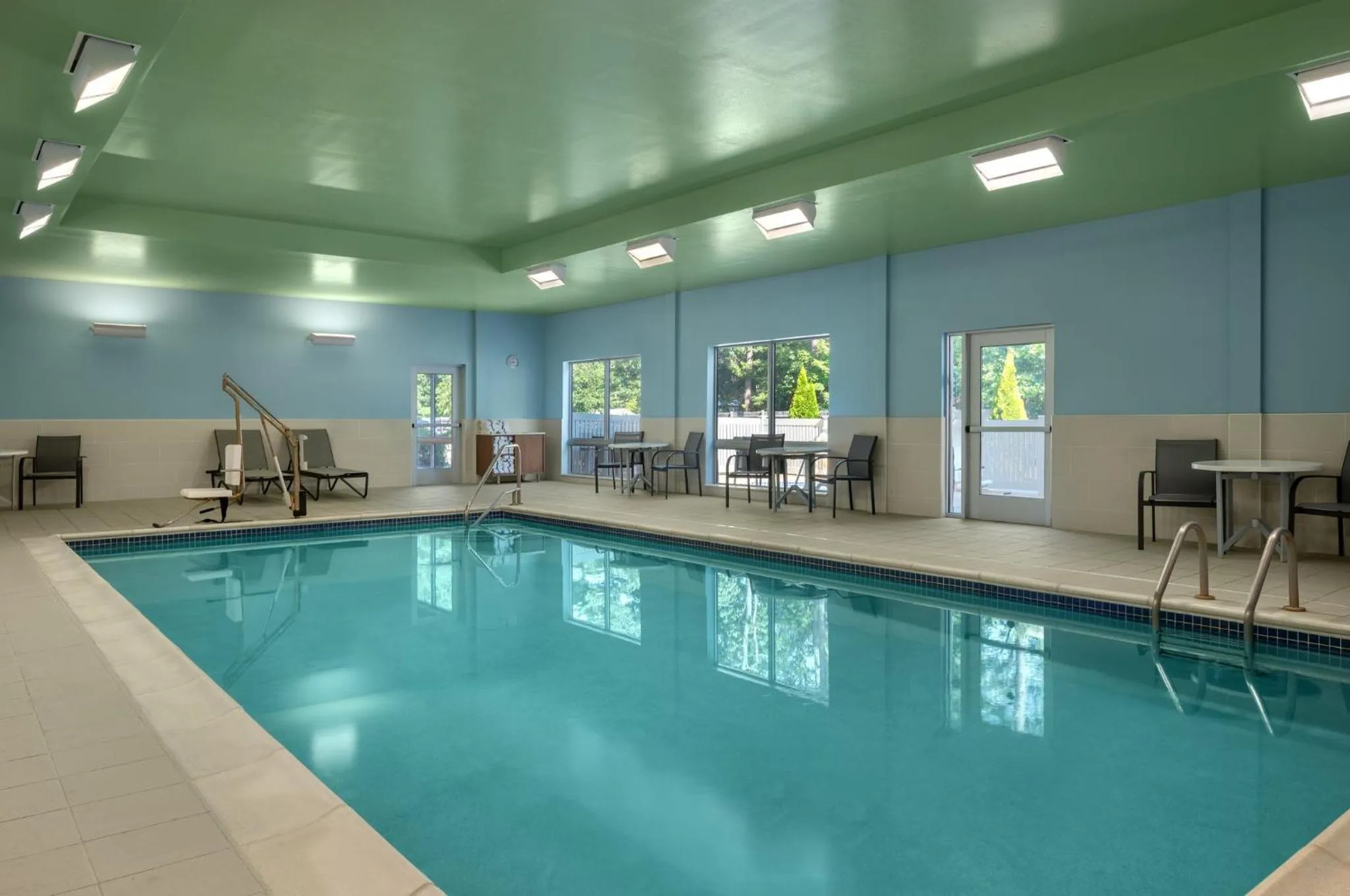 Swimming pool in Holiday Inn Express Queensbury-Lake George Area by IHG