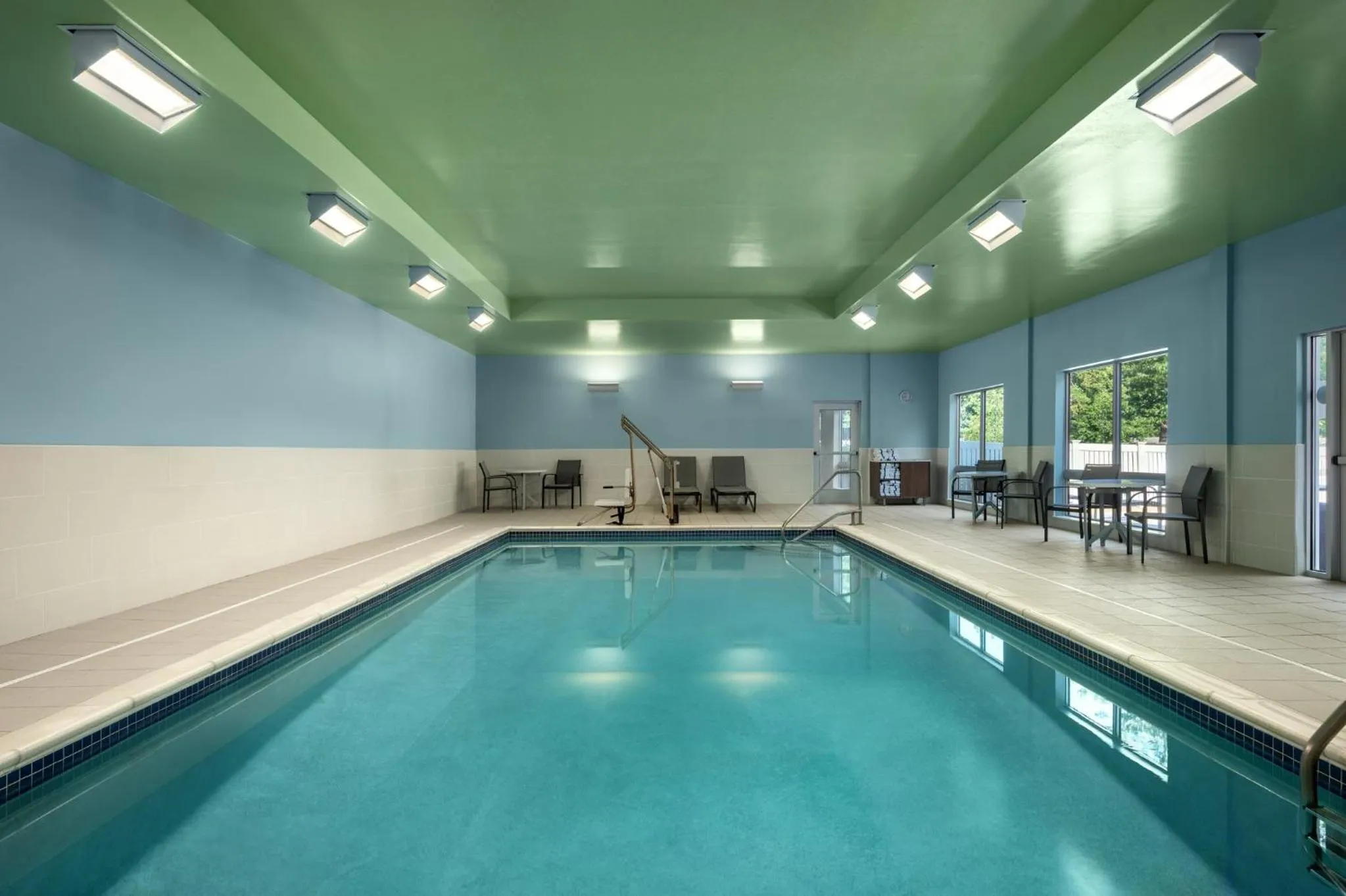 Swimming pool in Holiday Inn Express Queensbury-Lake George Area by IHG