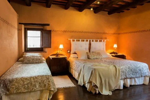 Bed in Casa rural Can Jepet