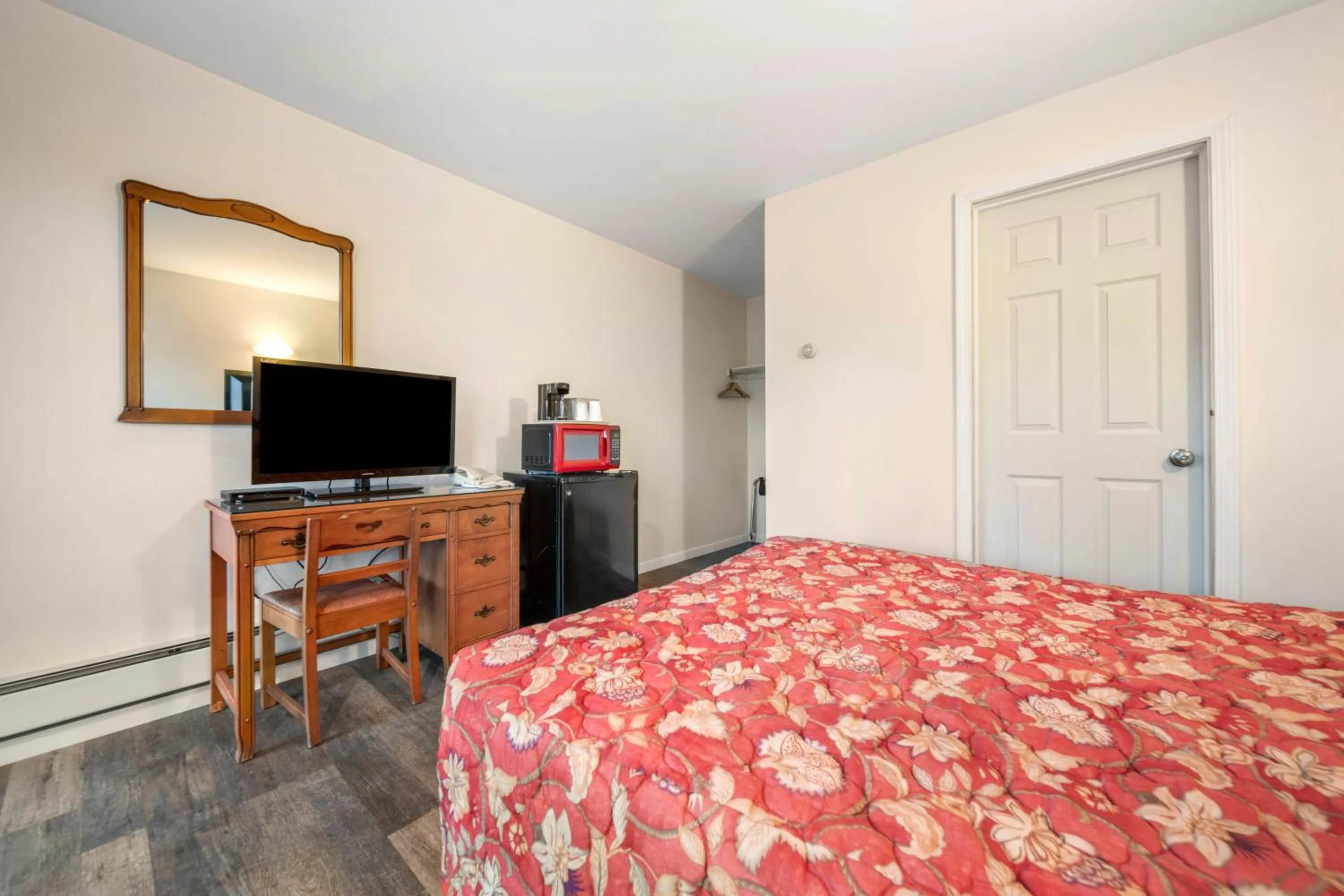 Bed in Thumb Heritage Inn